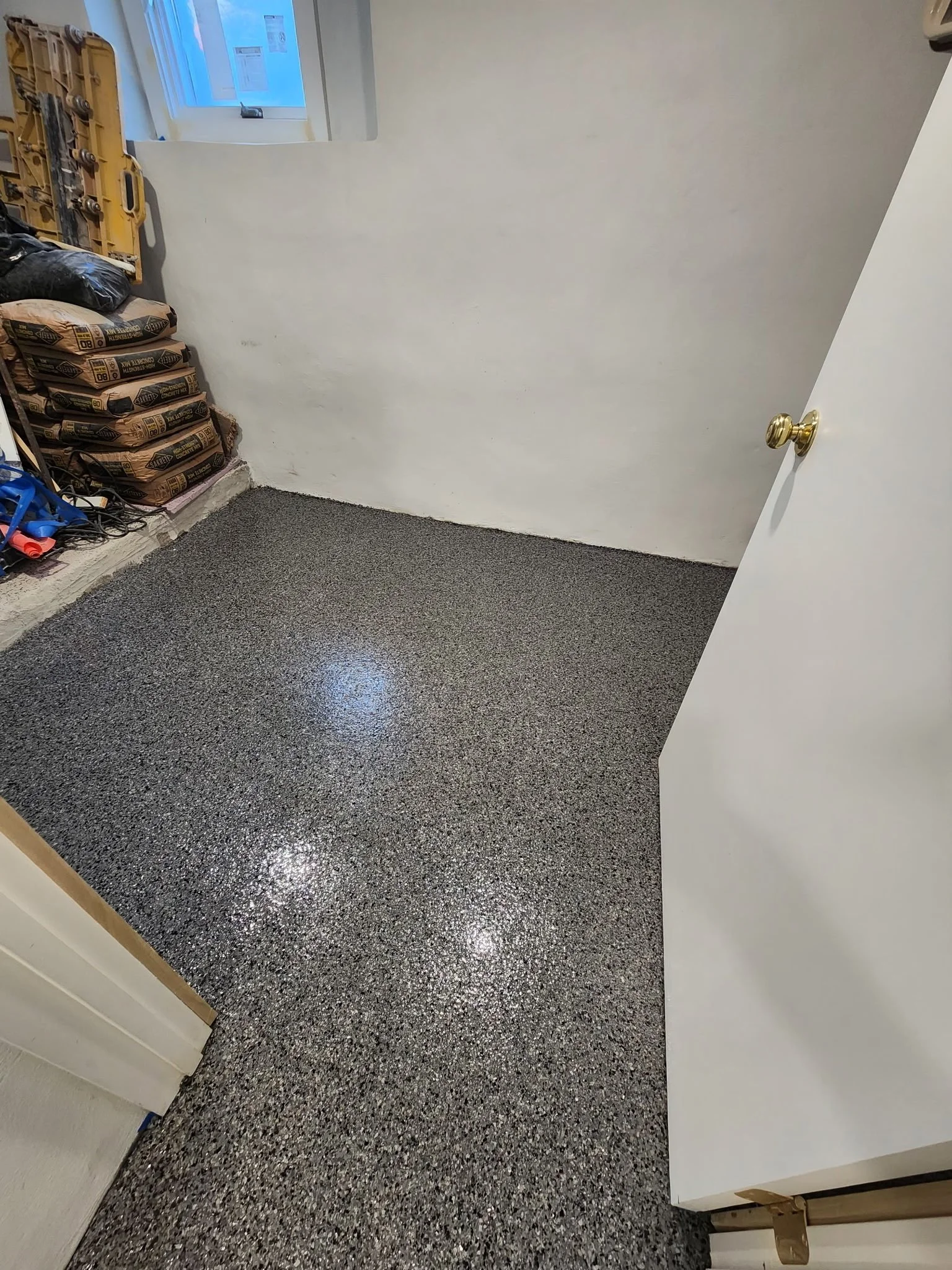 Finished flake epoxy floor in a basement nook, Danbury, CT