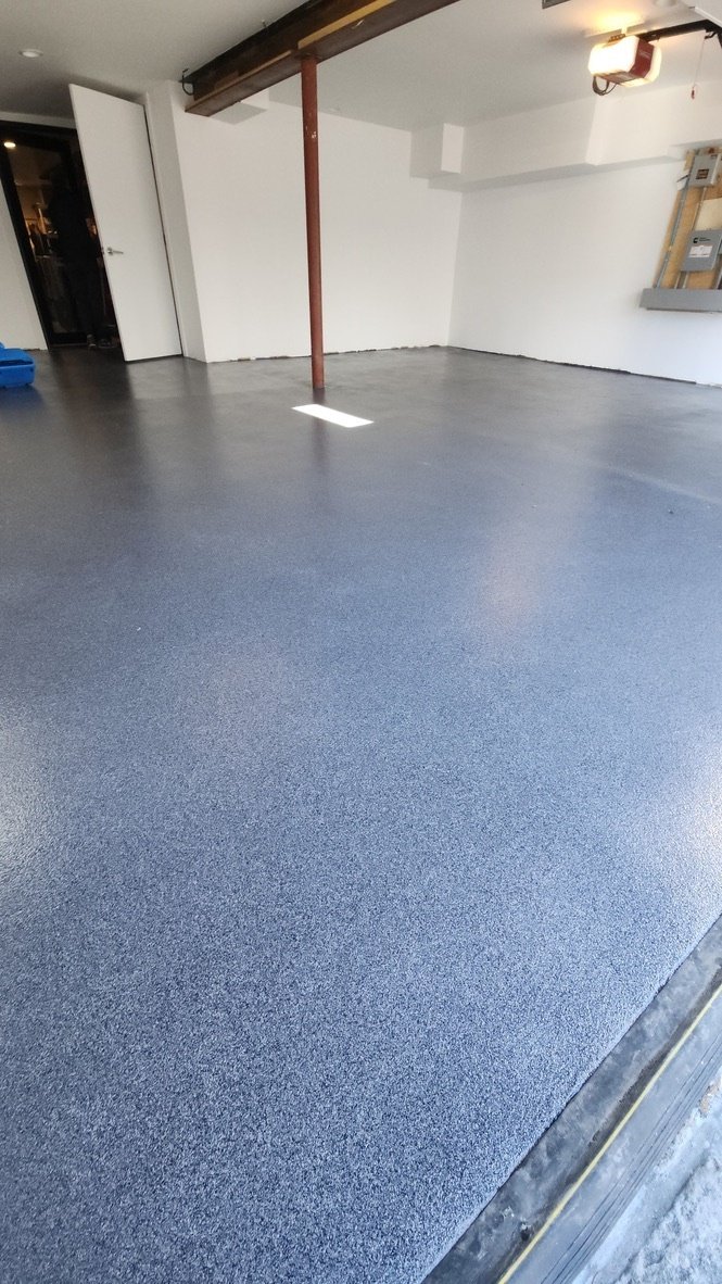 Finished epoxy flake garage floor with double garage doors open, Trumbull, CT epoxy flooring project