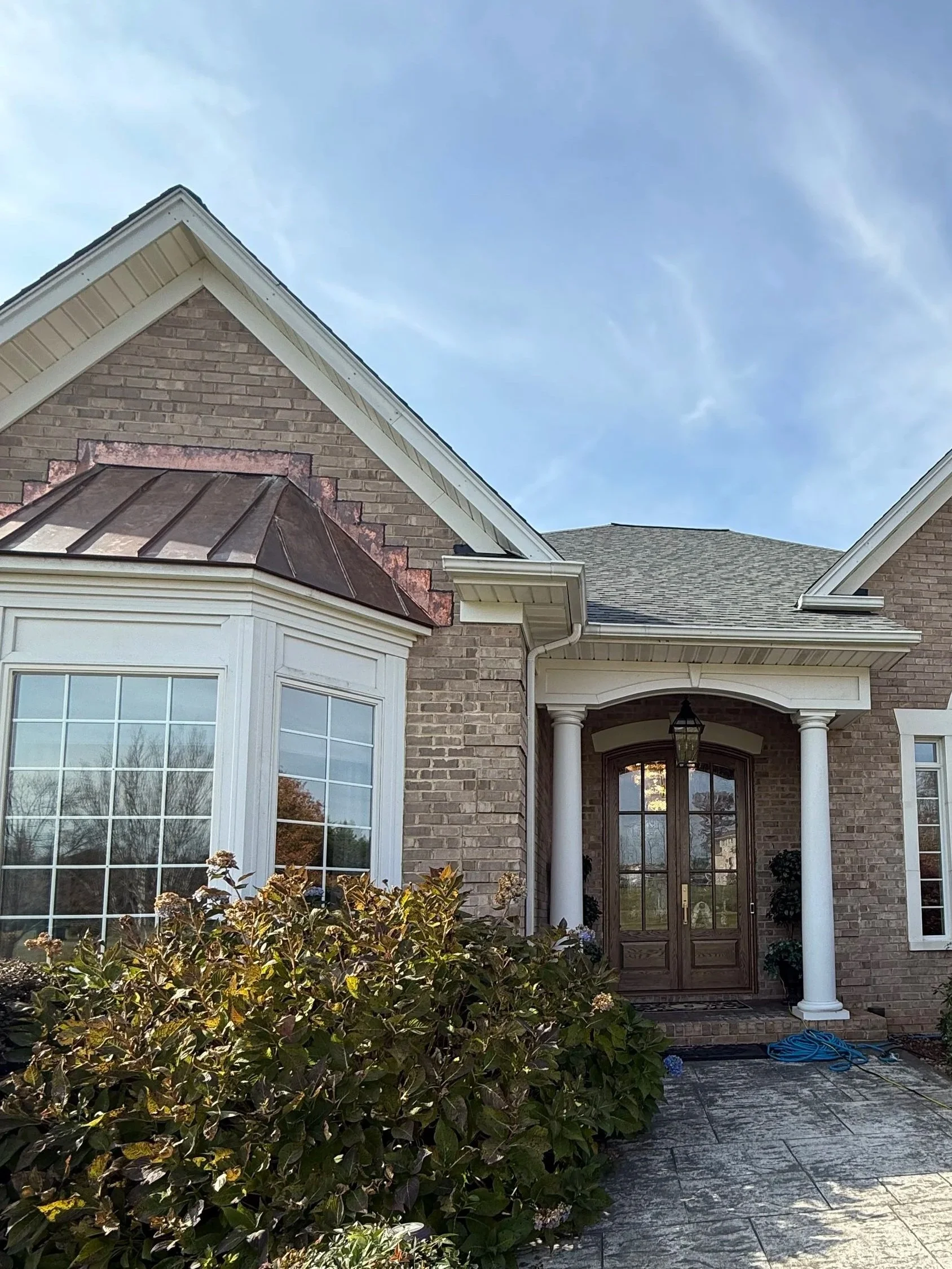 Custom front door and updated roof