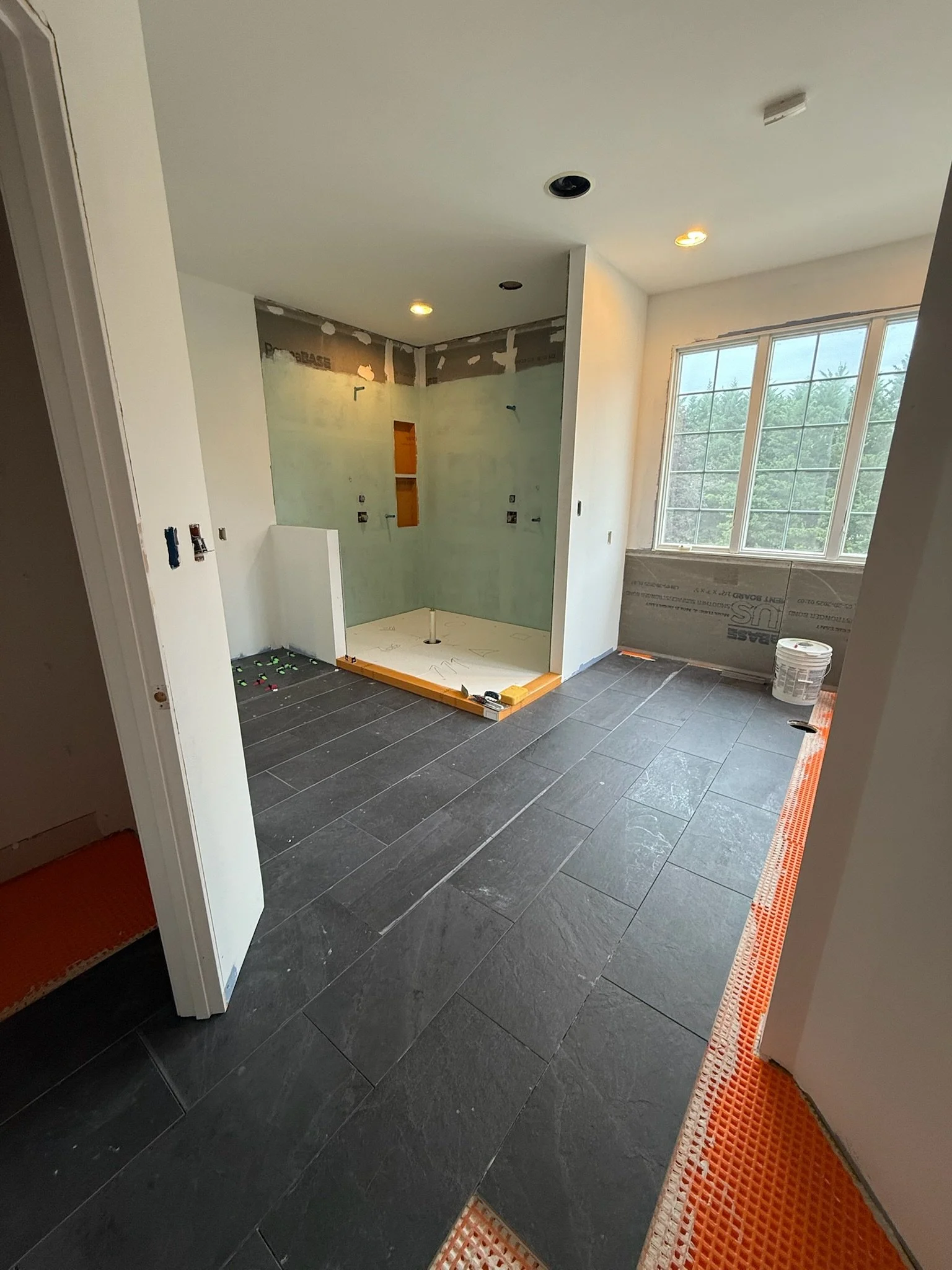 Primary Bathroom Tile Floor Installation