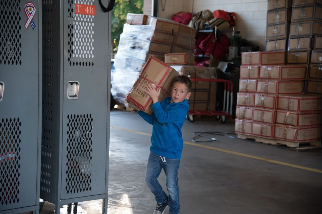 Madden working hard at the Coat Drive Oct. 2017