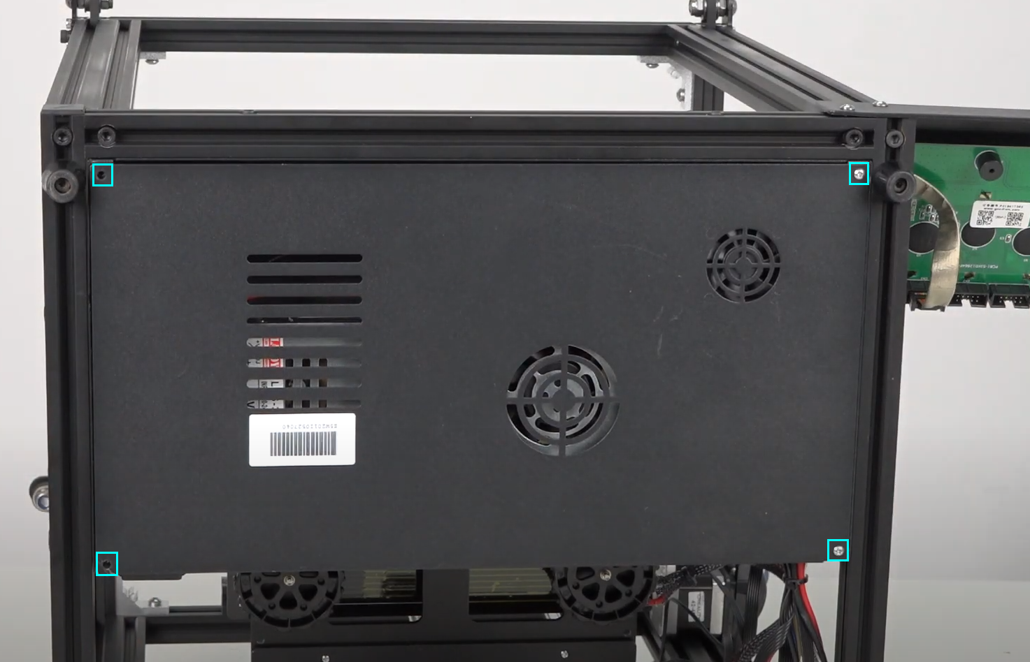 Remove the cover by removing the four screws under the printer.  Make sure to unplug the fan that is mounted to the cover.