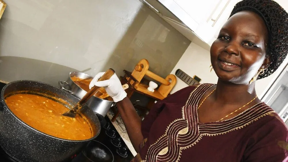 It's almost that time of year where residents and visitors can eat as many dishes from around the world to their heart's content. In the spirit of the upcoming Fusion Festival, The Daily Advertiser will be profiling some of the delicious cuisines that can be found in this city, and the people who can cook them with their eyes closed. Elizabeth Akoi fled South Sudan after conflict broke. She lived in Kenya for a few years, before she was able to come to Australia. "I moved here in 2007," she said. "At first I lived in Melbourne, then after three months I came to Wagga because it is a great place for children. I love it here." Ms Akoi now spends every Thursday morning cooking an array of Sudanese-inspired dishes to sell at the Riverina Producers Market. Beef, chicken are common proteins in the food that she cooks, and a specialty is kisra - flat bread made from sorghum flour.