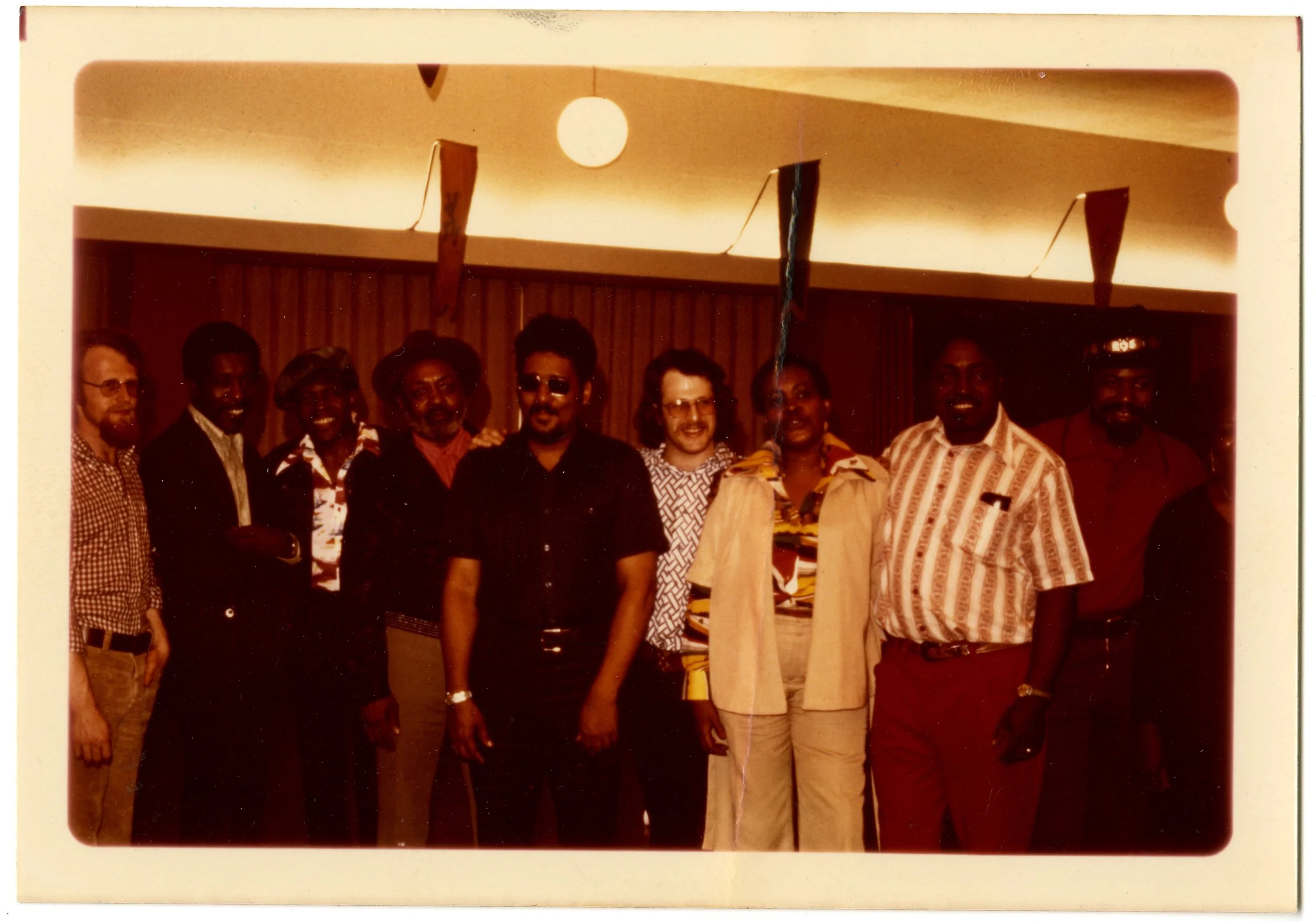 (l-r) Group shot from the 1975 Miami Blues Festival: John Fishel, Buddy Guy, Junior Wells, Robert Jr. Lockwood, Eddie Baccus, Jim Fishel, Mable Hillery, Johnny Shines, and unknown
