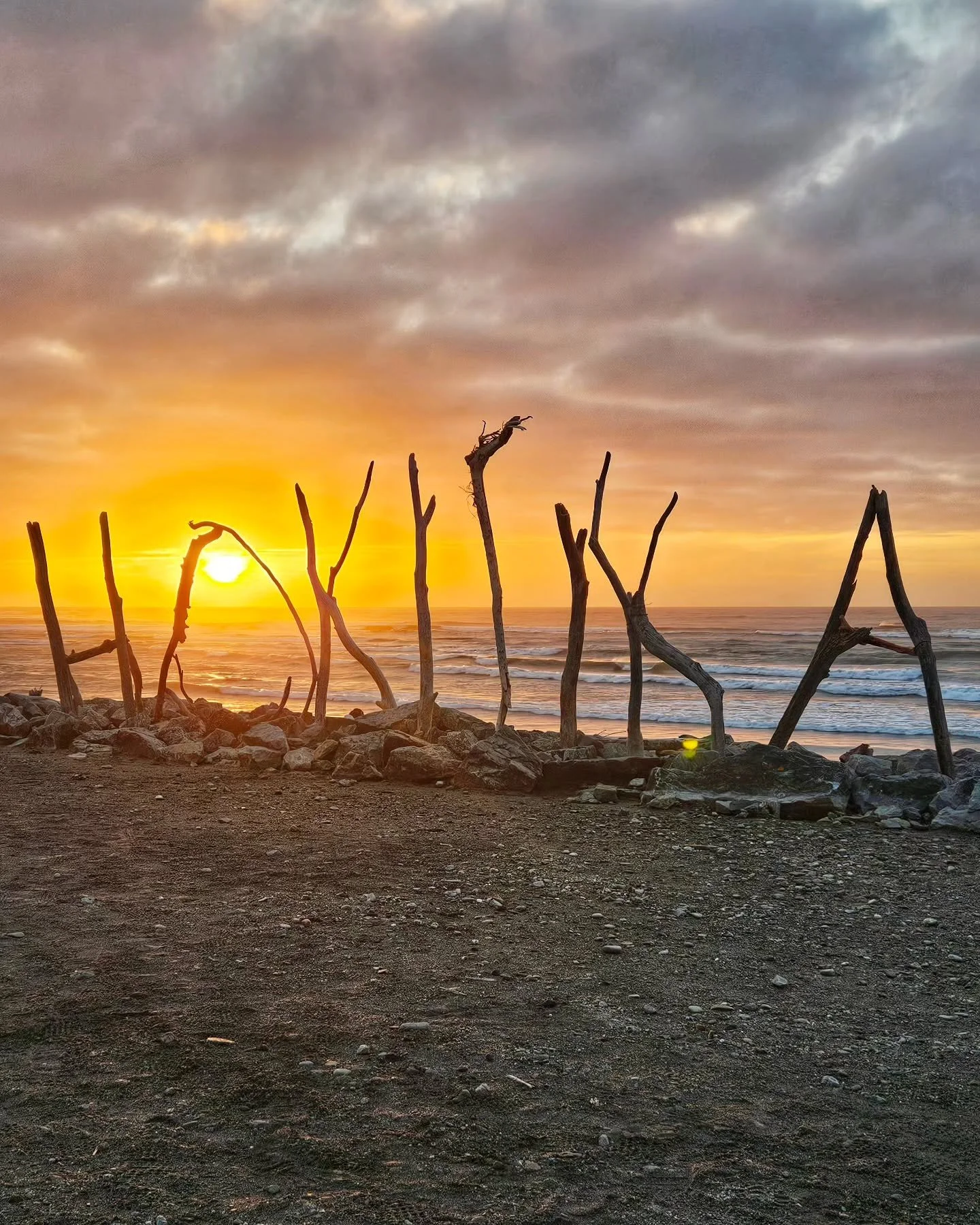 Pic of the day #93 
The Hokitika driftwood sign right on the beach.
I think I got the timing of the sun setting pretty well!