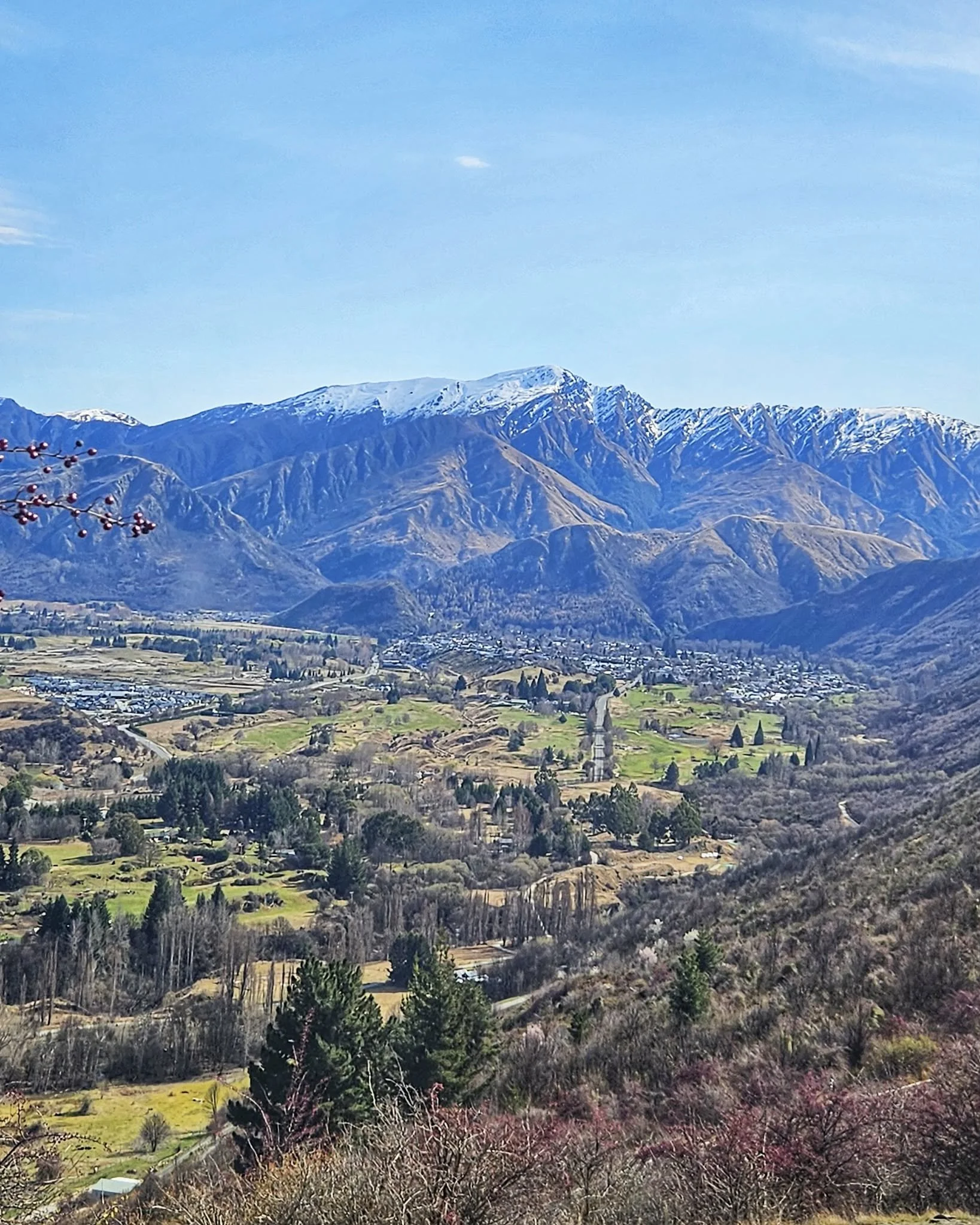 view over Arrowtown from the Crown Range