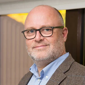 MANAGING DIRECTOR STUART COOPER In 1992 Stuart, alongside John Edwards, founded Cupaz, drawing on his vast experience in the industry as a designer, manufacturer, supplier and installer of office furniture. He prides himself on his ability to gain optimum utility from any office space. A merger in 2002 brought interiors expertise to the business, allowing Cupaz to offer a full floor to ceiling service. Stuart is currently expanding the Cupaz portfolio and expanding the client base into multiple sectors.