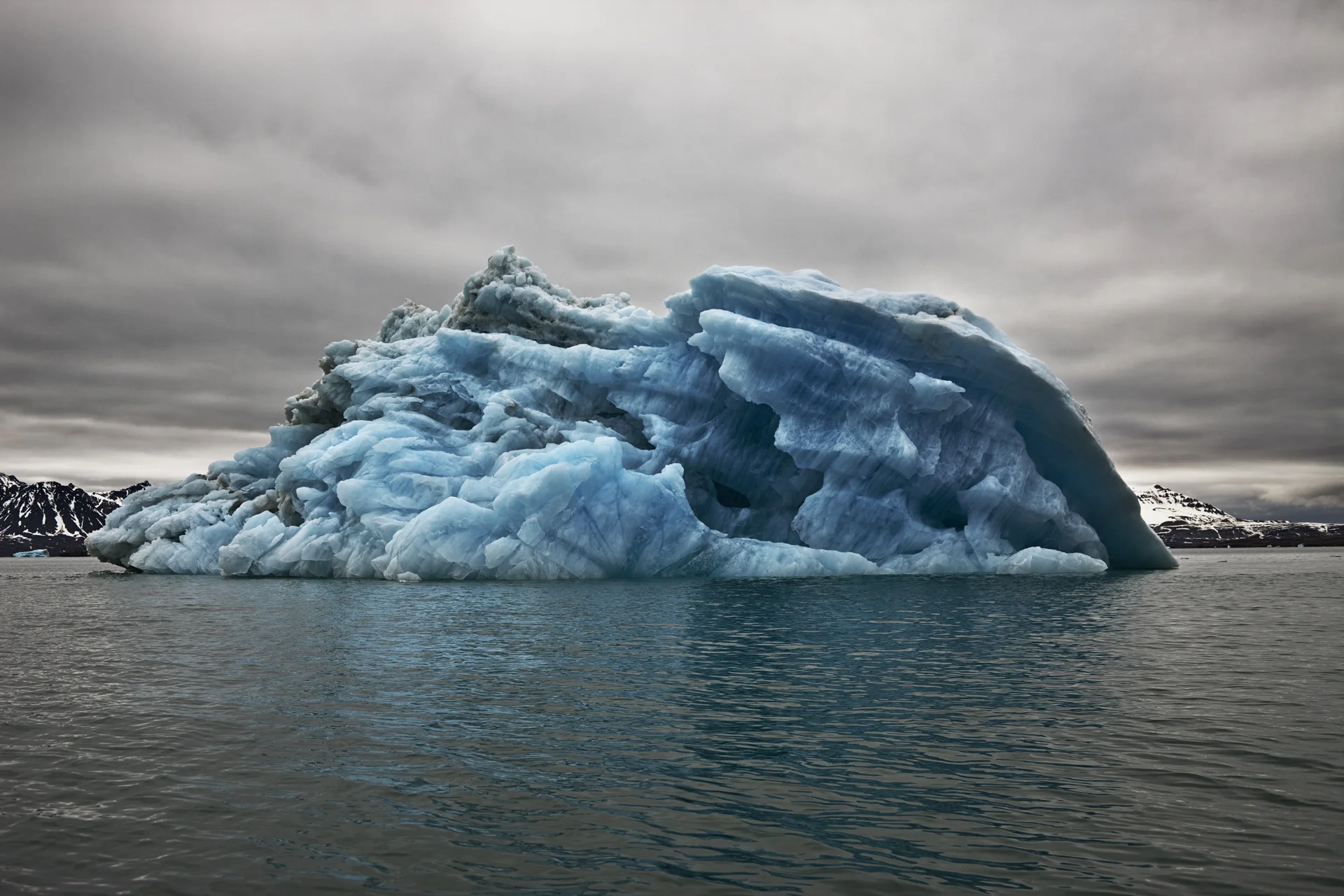 Blue Underside Revealed - Svalbard - July 5, 2010 - Camille Seaman - The Last Iceberg Series