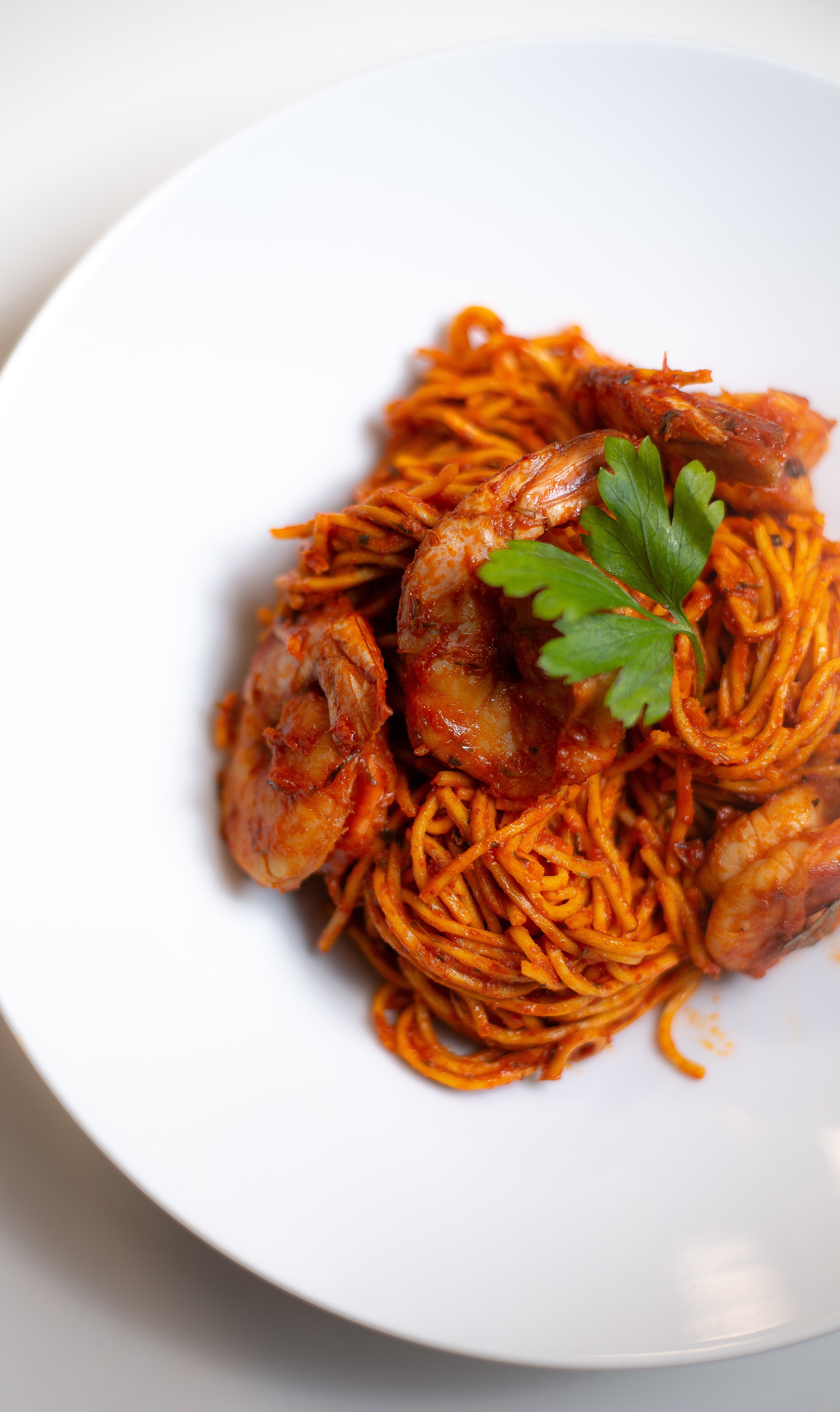 Jollof Spaghetti and Tiger Prawns