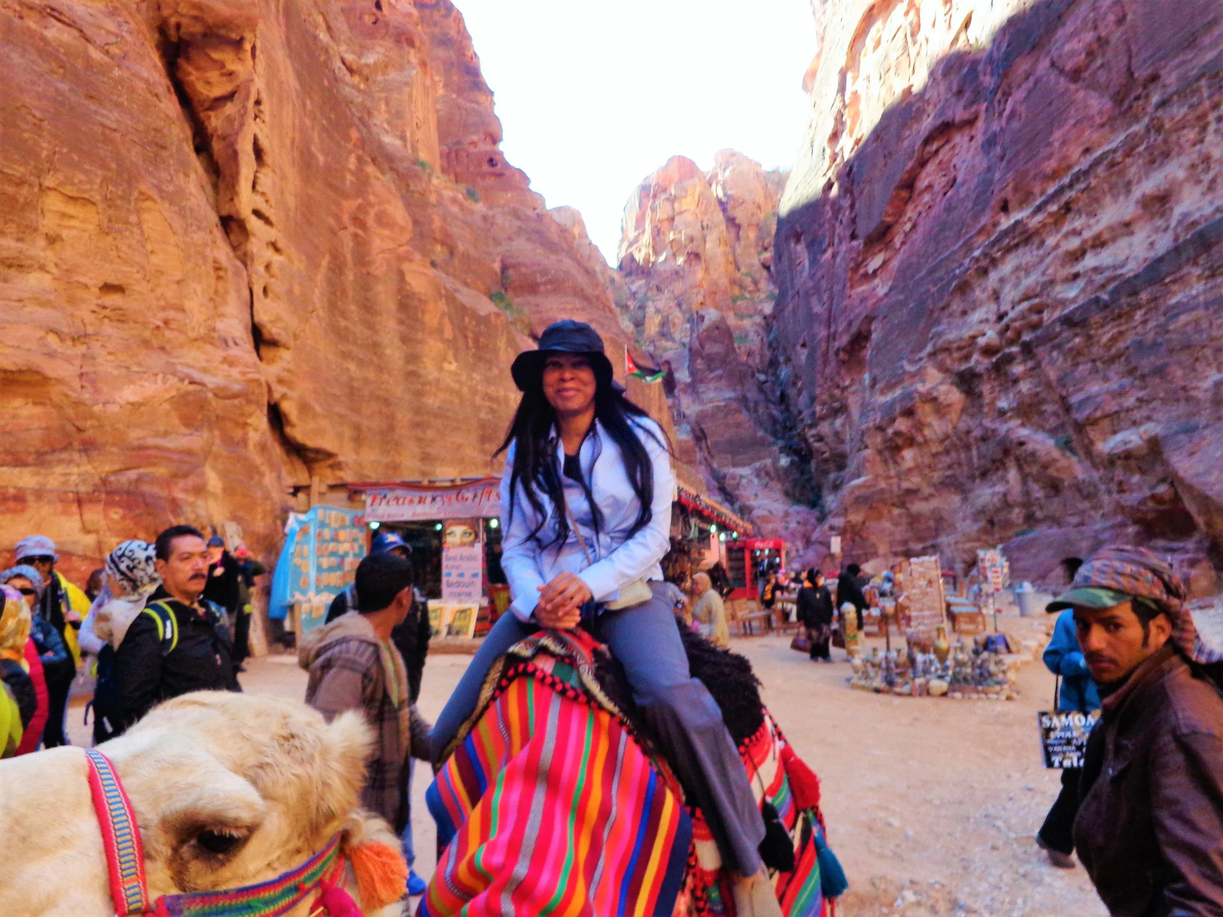 Spotts on a camel in Petra, Jordan // Image provided by Spotts