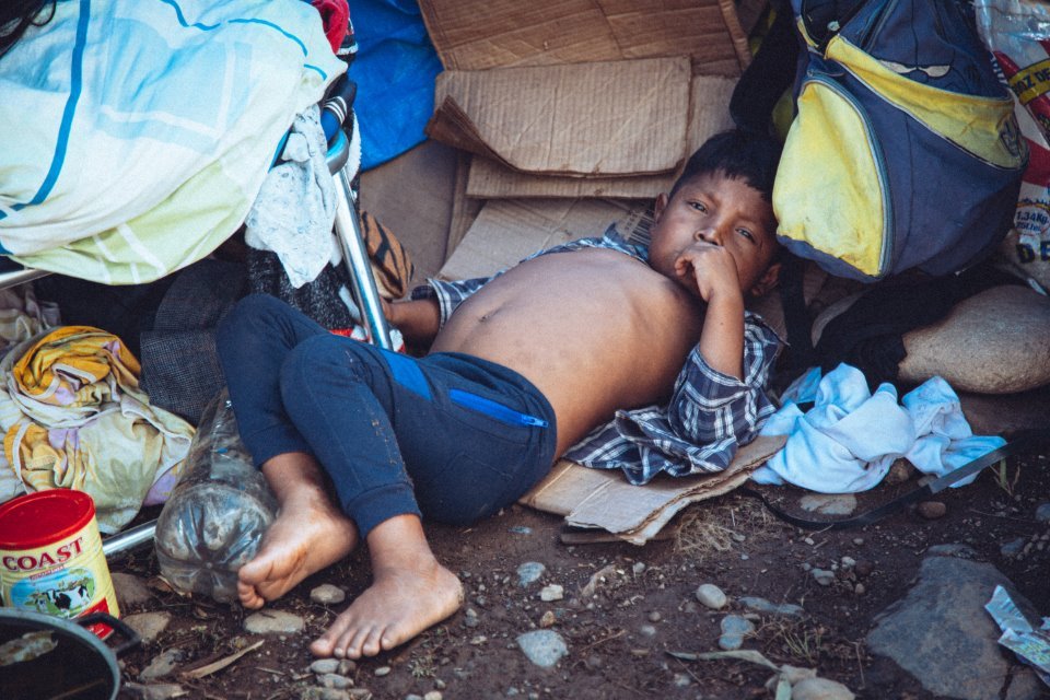 homeless indigenouschild sleeping on the fllor.jpg