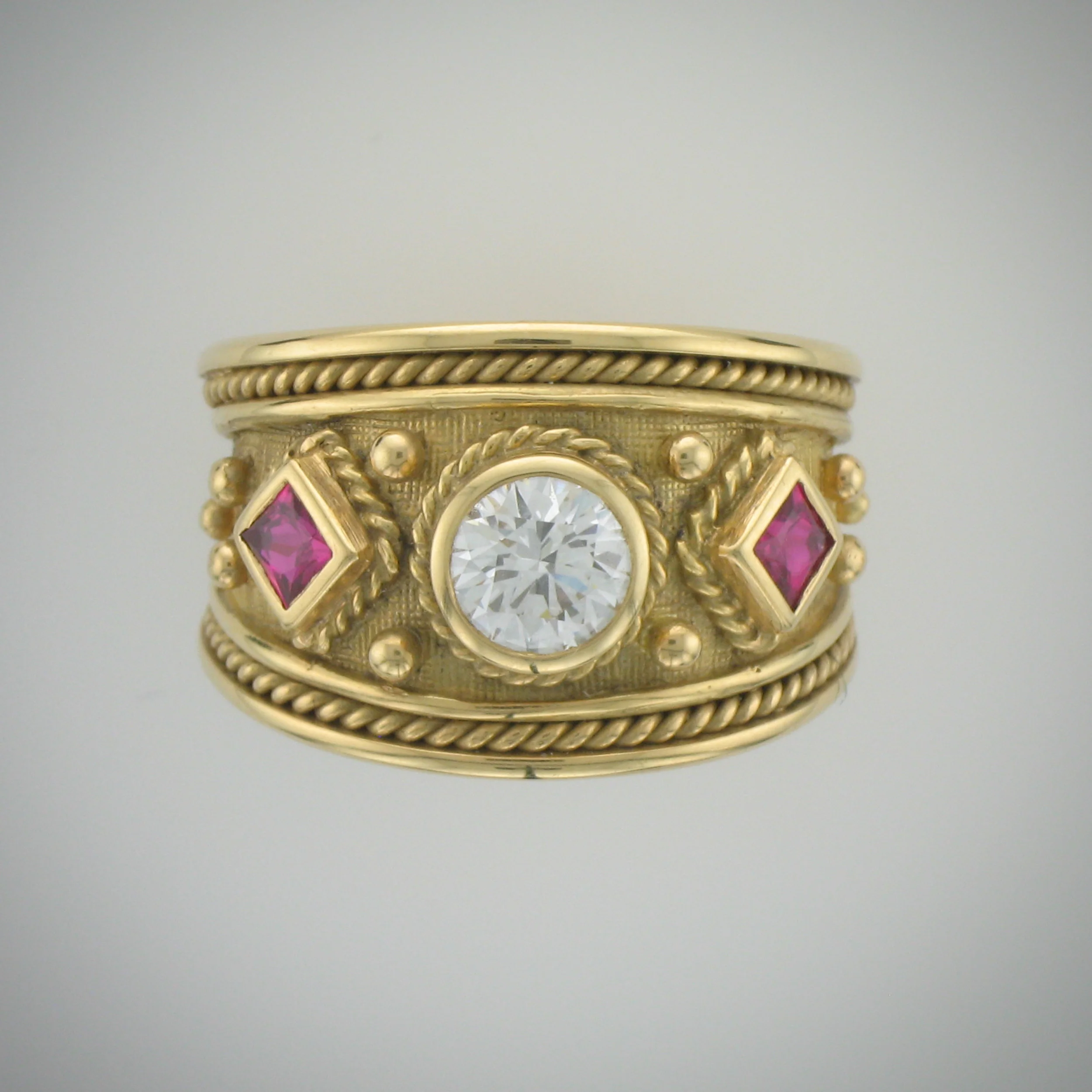 18K Yellow Gold Byzantine Ring with Round Center Diamond and Princess Cut Pink Sapphires.jpg