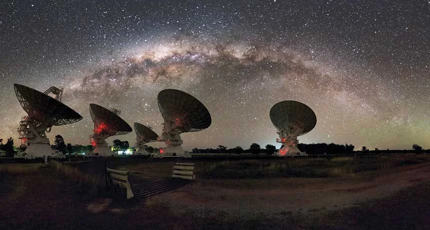 Radio telescopes observing the night sky. (Credit: Alex Cherney)