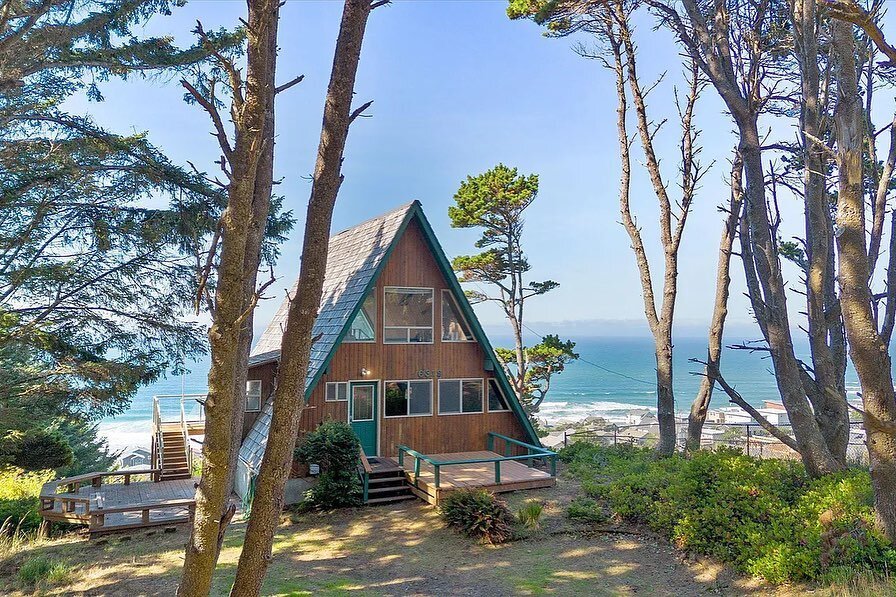 A+ 👋 🏡 🌊 
An A-Frame at the beach with a half an acre of land and 3 bedrooms and multiple balconies?! A dream, yes! Unattainable, maybe not- this one is listed for a cool $645,000. I have rarely seen panoramic views like this for that price! This 