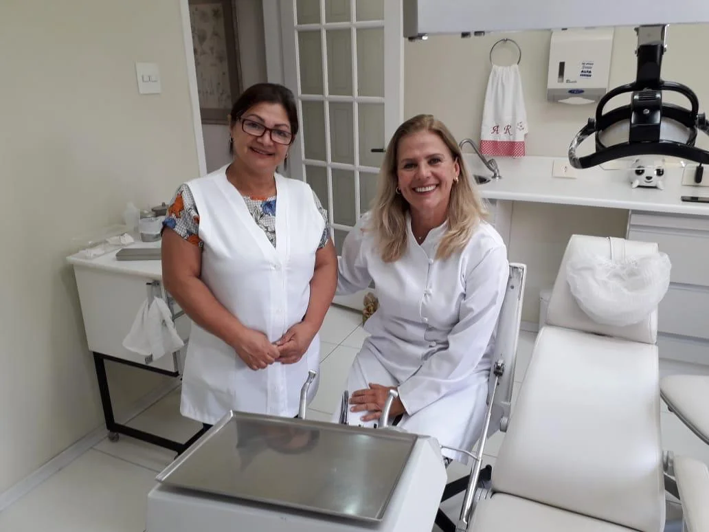Ana Rosa D’Ercole (right) and her assistant, Nena, in the São Paulo dental clinic.