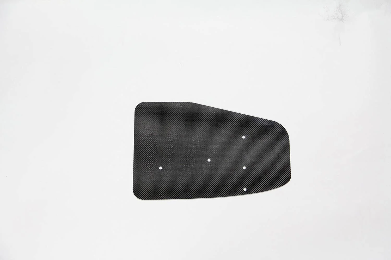 The custom panel was made from 4mm-thick carbon fiber sheet. It replaced the heavier plastic panel and had the perfect mounting holes needed for the umbrella holder. The panel was cut by WAZER in roughly 6 minutes, using 2 pounds (1kg) of abrasive.