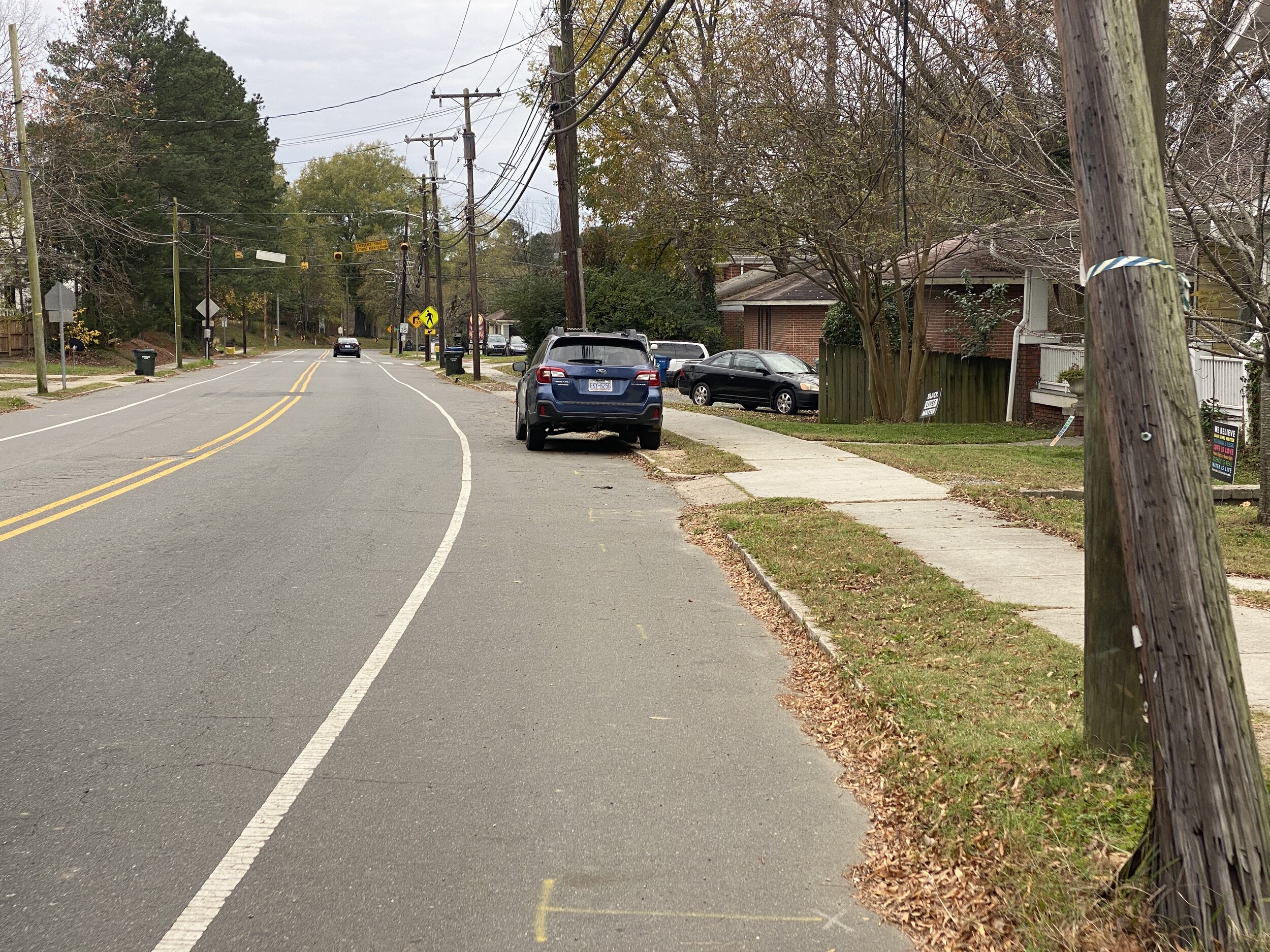 Parked in bike lanes.JPG