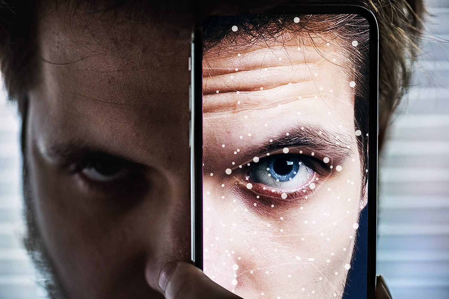photodune-21126739-a-smartphone-using-face-id-recognition-system-1500-1000.png