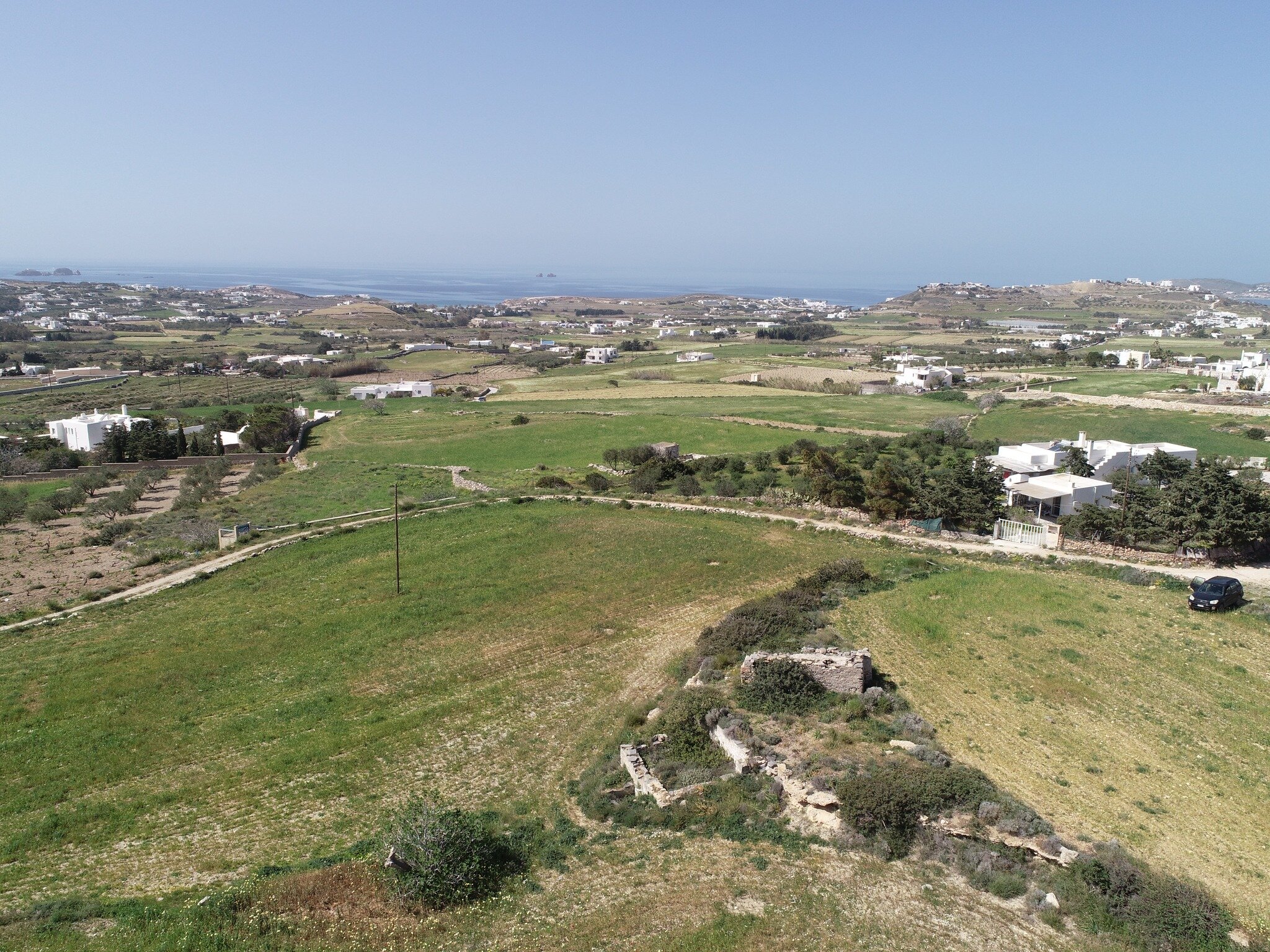 Located at the outskirts of Paroikia, Paros, this 16.088 m2 plot offers breathtaking sunset views over the Aegean Sea. With the potential to build a hotel of 1.300 m2, this plot presents a lucrative opportunity for investment in the hospitality secto