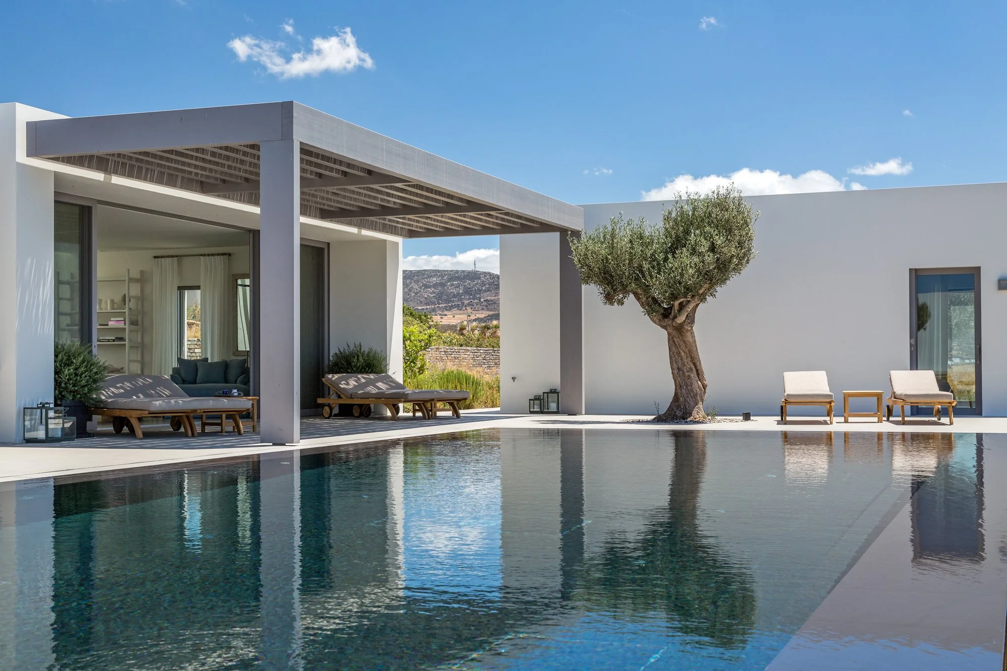 Villa Aurora II is located in the heart of the Cyclades in a 4,000 sqm, fully landscaped plot with direct access to the water and spectacular views of the Aegean Sea and Antiparos Island. The house consists of an expansive outdoor area, featuring an 