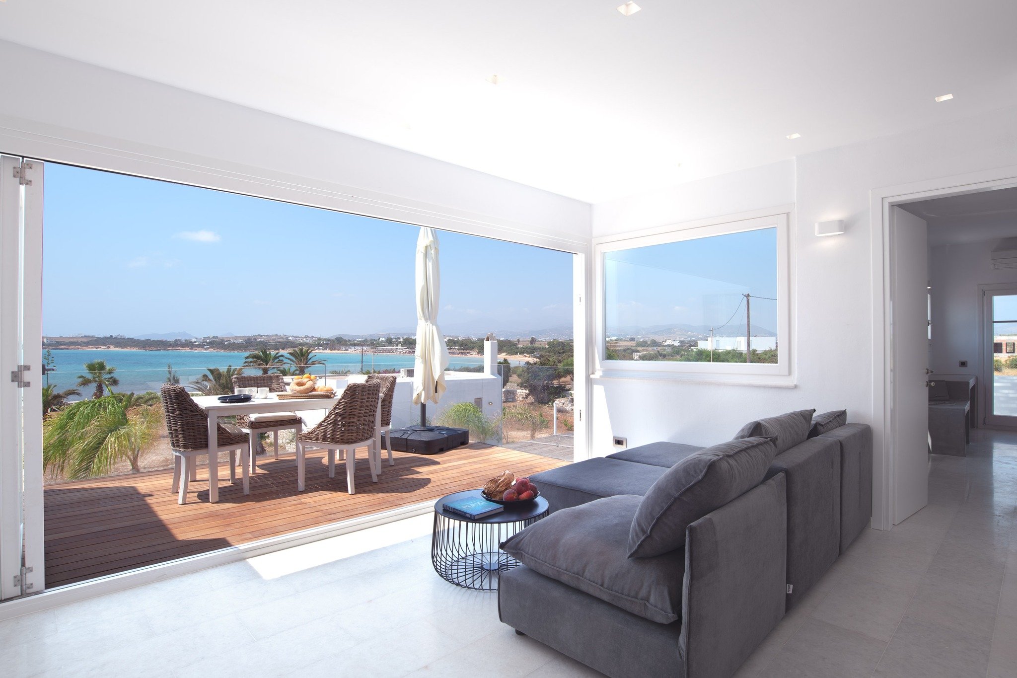 Experience island living at its finest in this upper-floor apartment just 50 meters from the sea and Santa Maria&rsquo;s beautiful beach. Featuring 2 elegant ensuite bedrooms, this bright and airy space is designed for comfort and tranquility. An ext