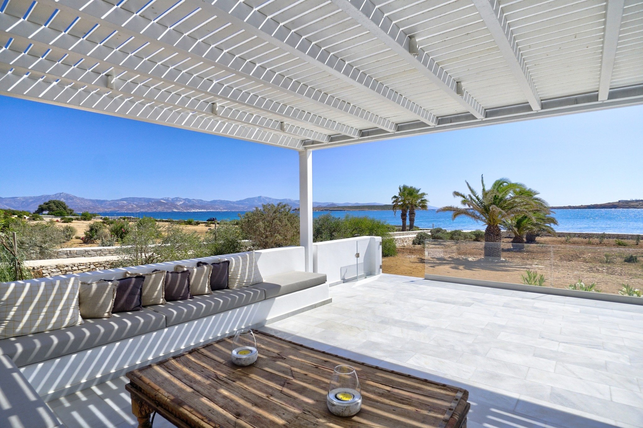 Perfect for families or groups, this spacious 4-bedroom unit offers comfort, flexibility, and a prime location just steps from the sea and Santa Maria&rsquo;s sandy beach. The main unit features 3 welcoming bedrooms and 2 modern bathrooms, while an i