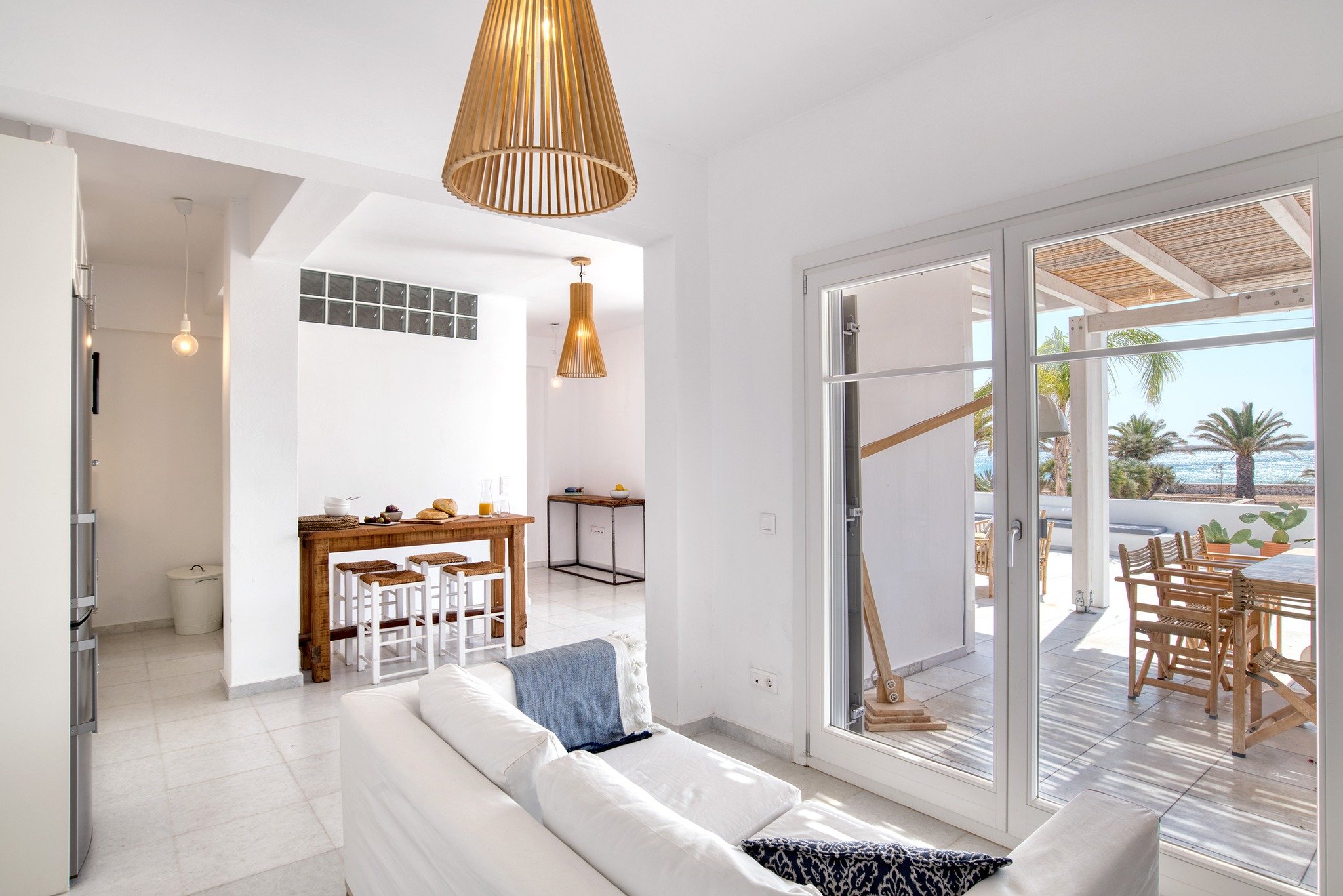 Just steps from the crystal-clear waters and sandy beach of Santa Maria, this newly refurbished 90 m&sup2; home offers the perfect blend of comfort and island charm. Enjoy a spacious 120 m&sup2; private veranda with a breathtaking sea view&mdash;idea