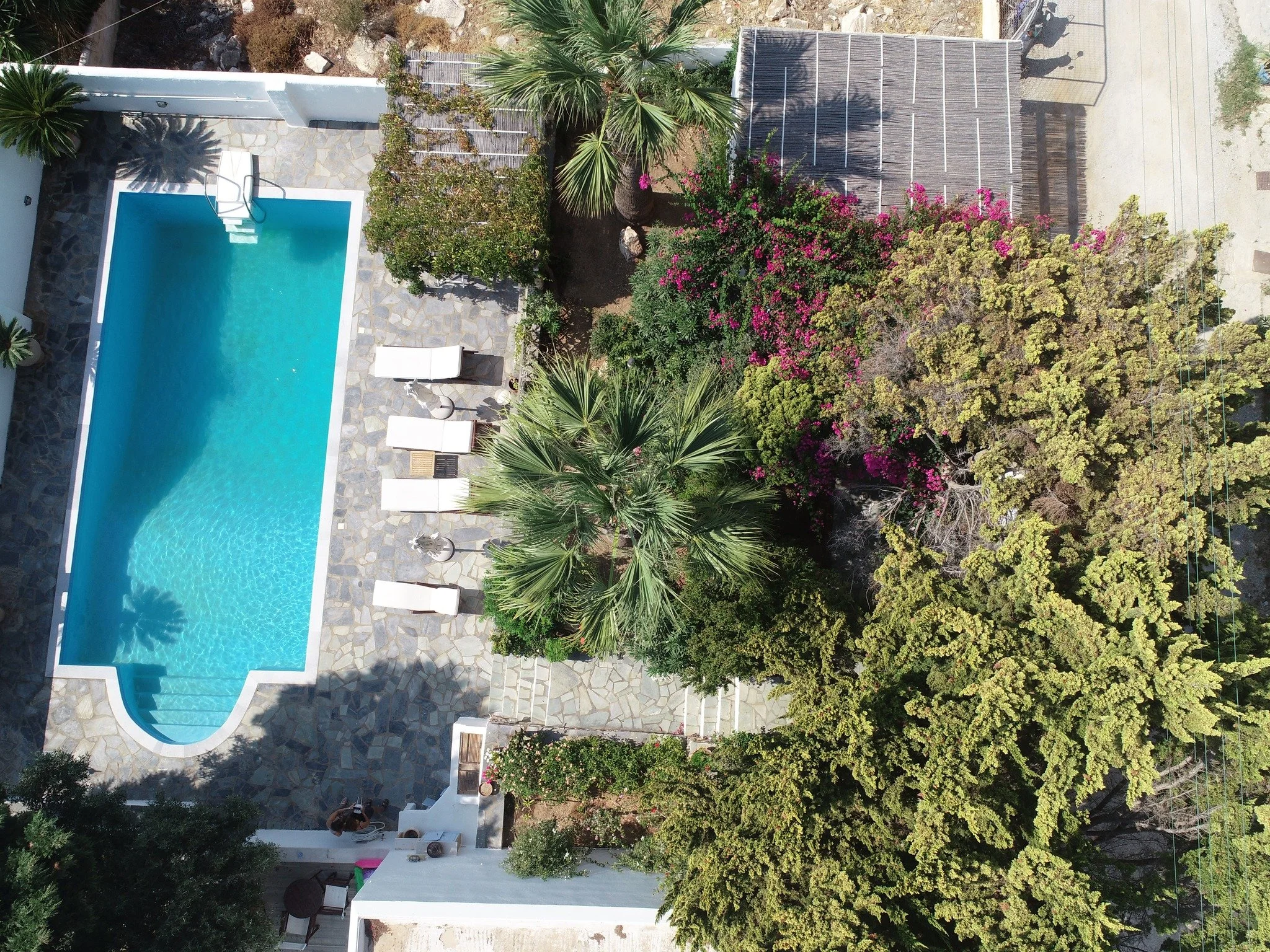 Experience refined island living in this luxury villa in Naousa, Paros, located just 2 minutes from the cosmopolitan center of Naousa. Combining authentic Cycladic architecture with modern comfort, the villa offers a peaceful retreat while being step