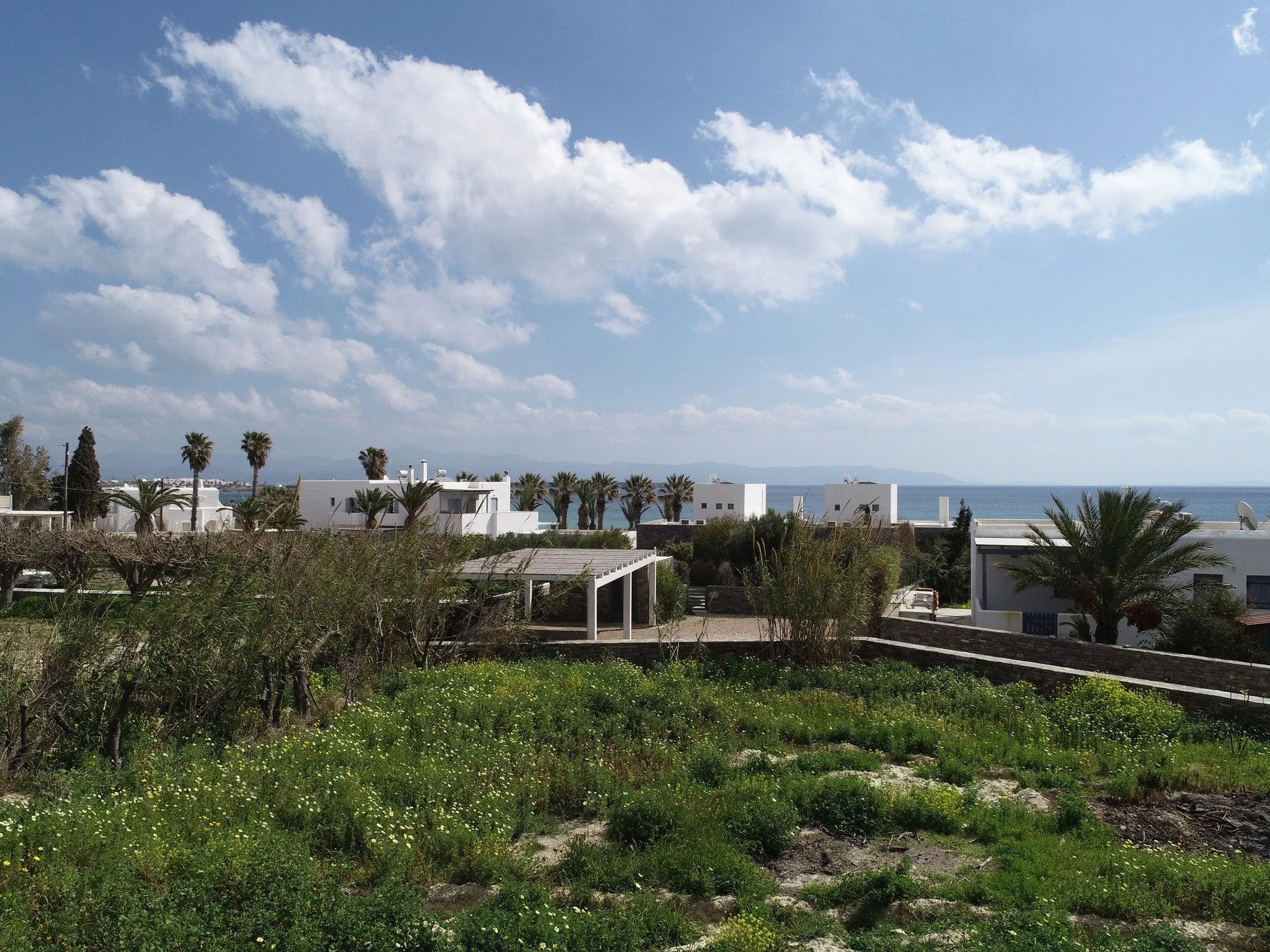 Nestled in the charming settlement of Drios on the southern coast of Paros, this 588.70 sqm plot offers an exceptional opportunity for those seeking to build their dream residence just steps from the sea. Part of a larger 2,180 sqm parcel, this verti