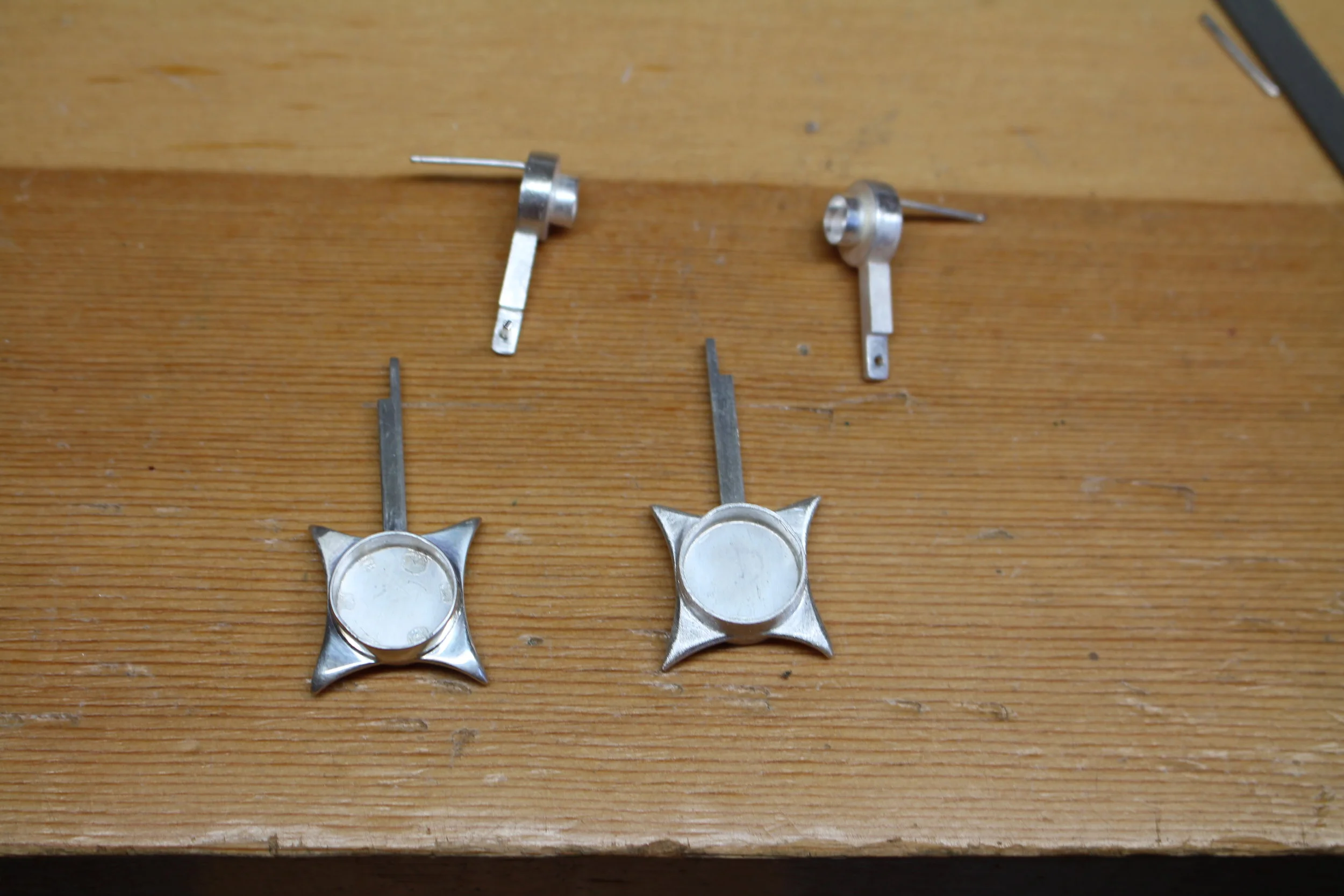 Shaping the star bottom of earring.jpg