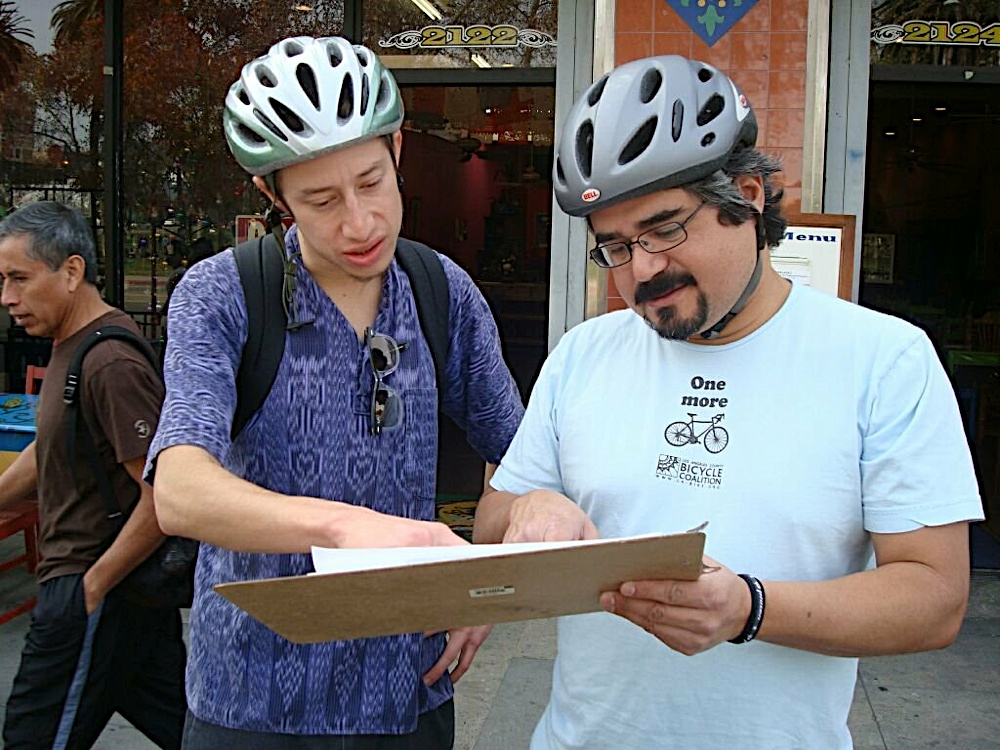 Julio and Efren review the list of possible sites