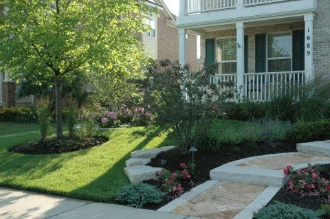 Beautifully landscaped backyard with custom design and vibrant plants in Arlington Heights, IL