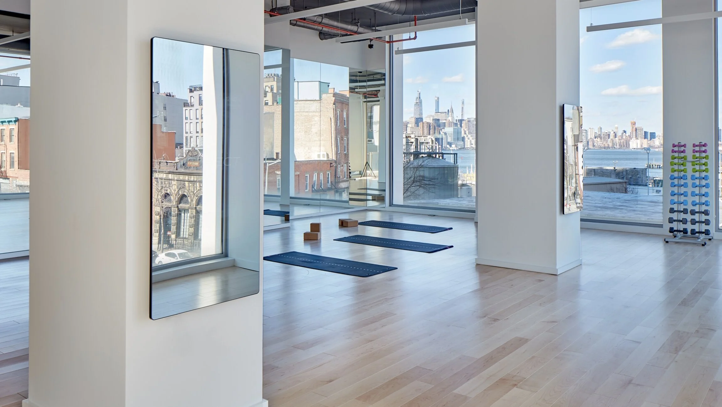 Two Echelon Reflect mirrors in high-rise NYC, multifamily fitness trends