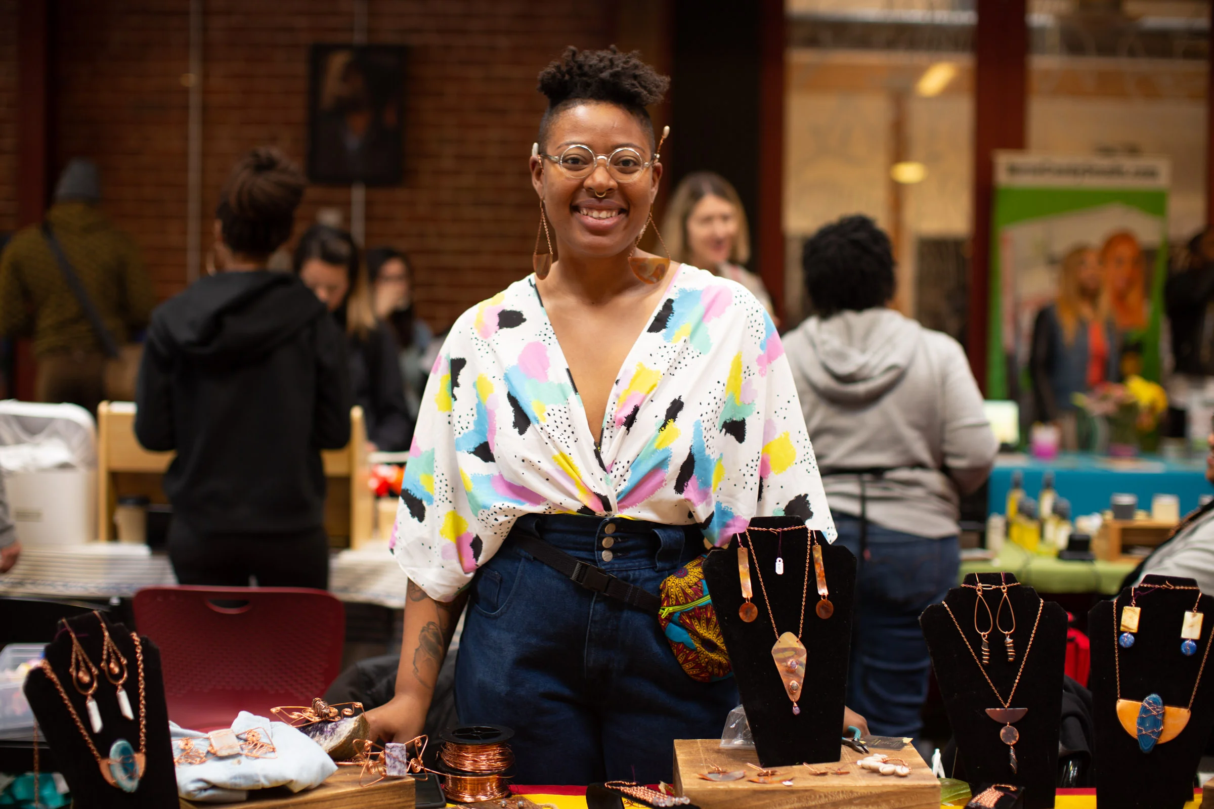 Ayana Omilade Flewellen, owner of Dovie's Divine Jewelry. Photo by Tumay Aslay.