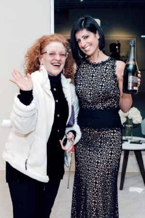 Lauren with artist Nancy Lamb at Laura Wilson: Photographs in the West opening reception at Fort Works Art. Photo by Walt Burns.