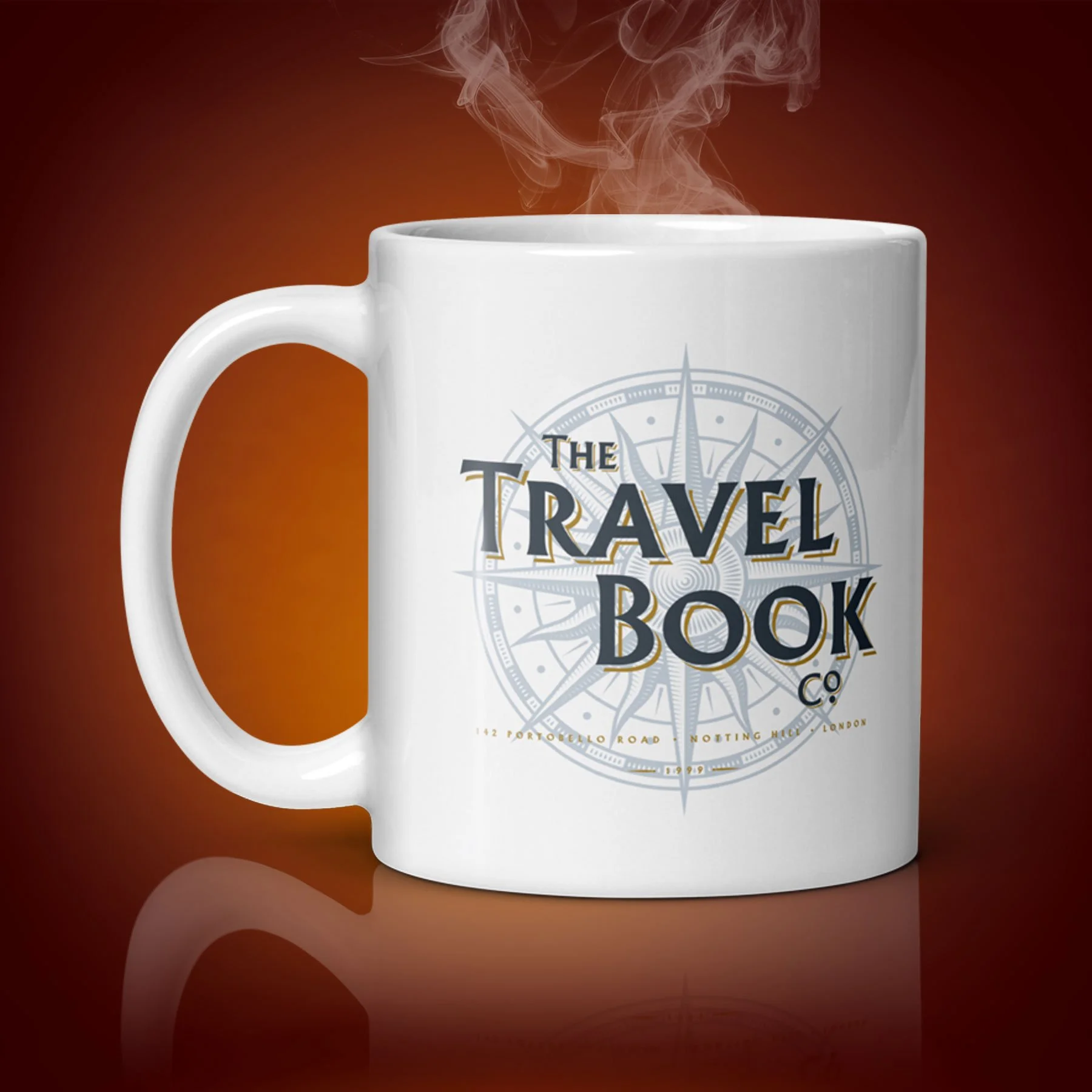 An 11-oz The Travel Book Co mug displays the right side. The artwork on our mug is inspired by the movie "Notting Hill". It is available for $21.99 with free shipping.
