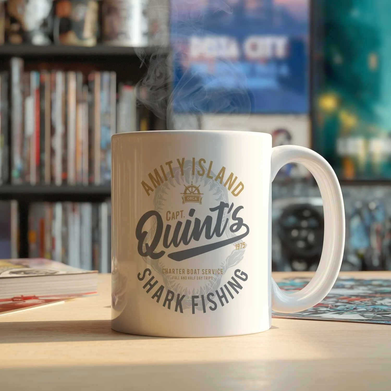 A Quint's Shark Fishing mug is displayed on a table, filled with coffee.