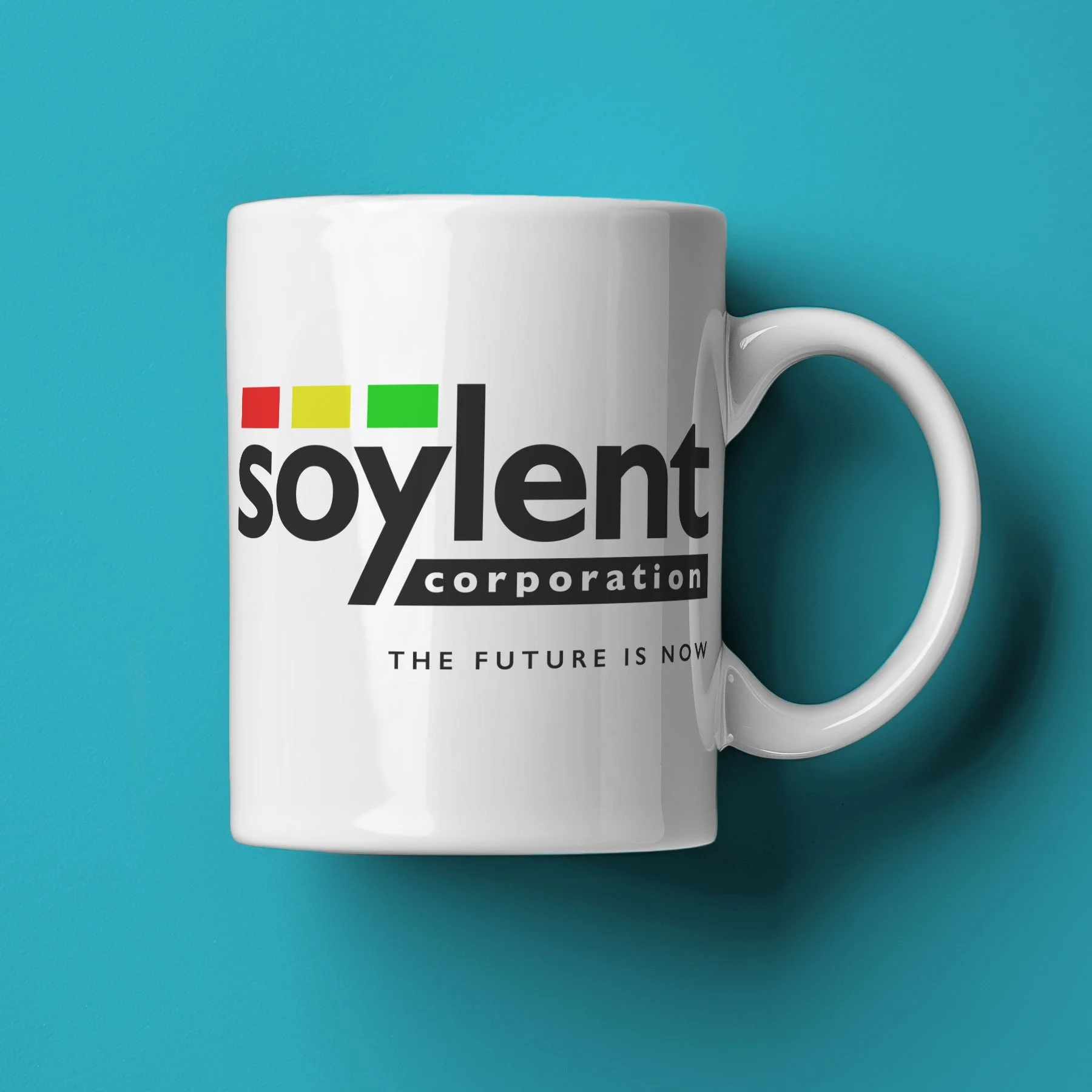 A Soylent Corporation Mug lies on its side against a mint green background.