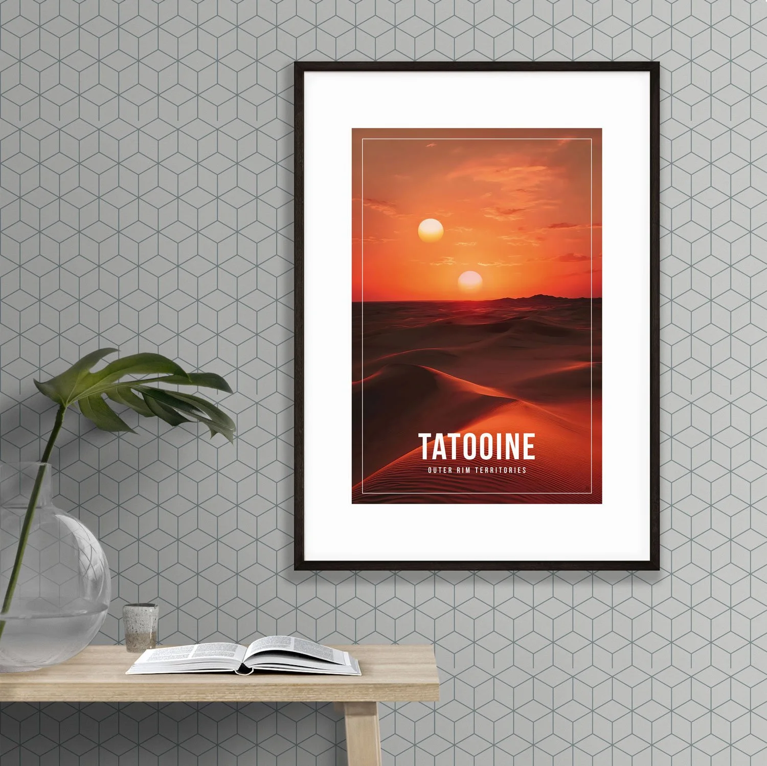 Photo of an A2 frame holding a 12x18 inches Tatooine poster hanging on a wall next to a table made of light wood with an exotic green plant.