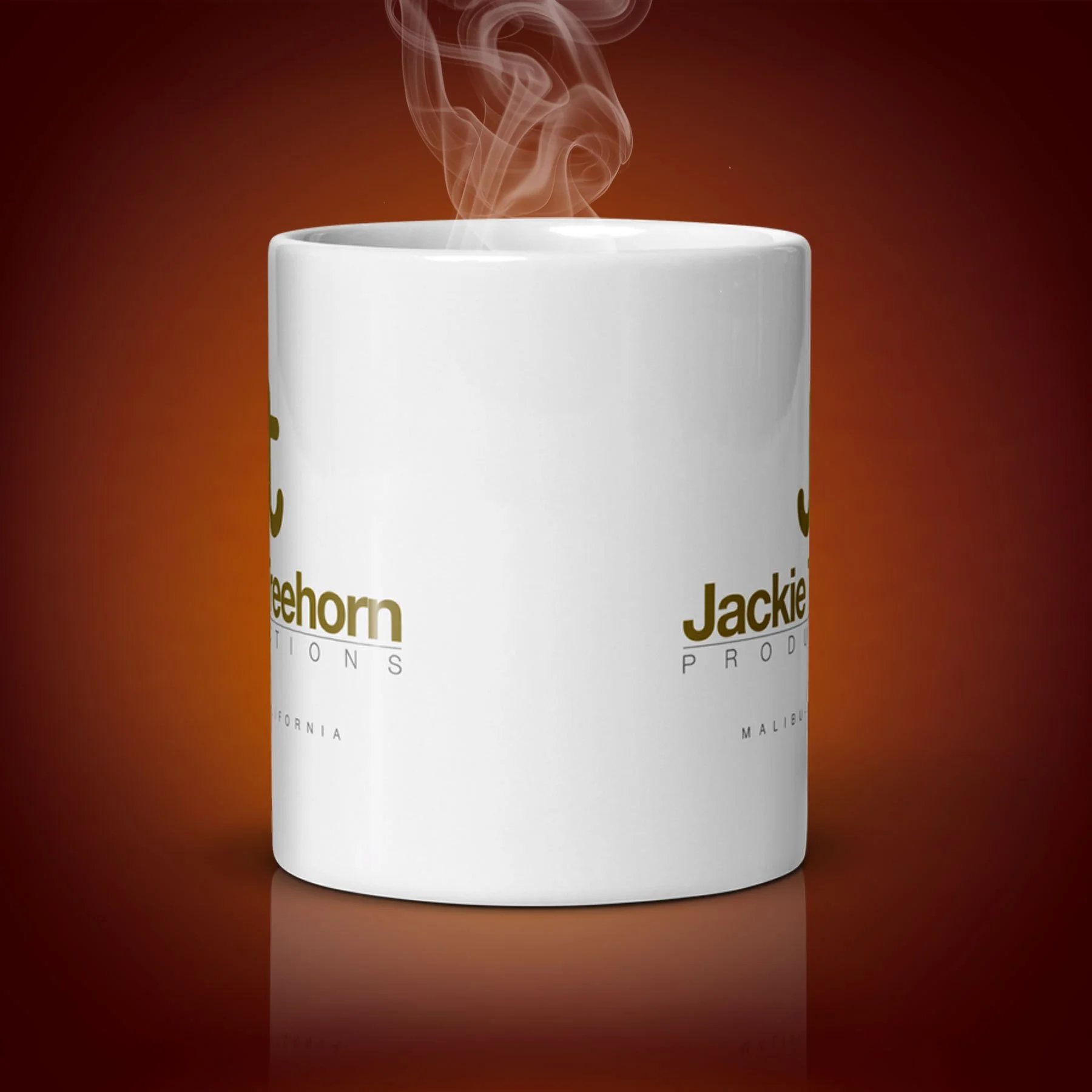 An 11-oz Jackie Treehorn Mug displays the center side. The artwork on our mug is inspired by the movie "The Big Lebowski". It is available for $21.99 with free shipping.
