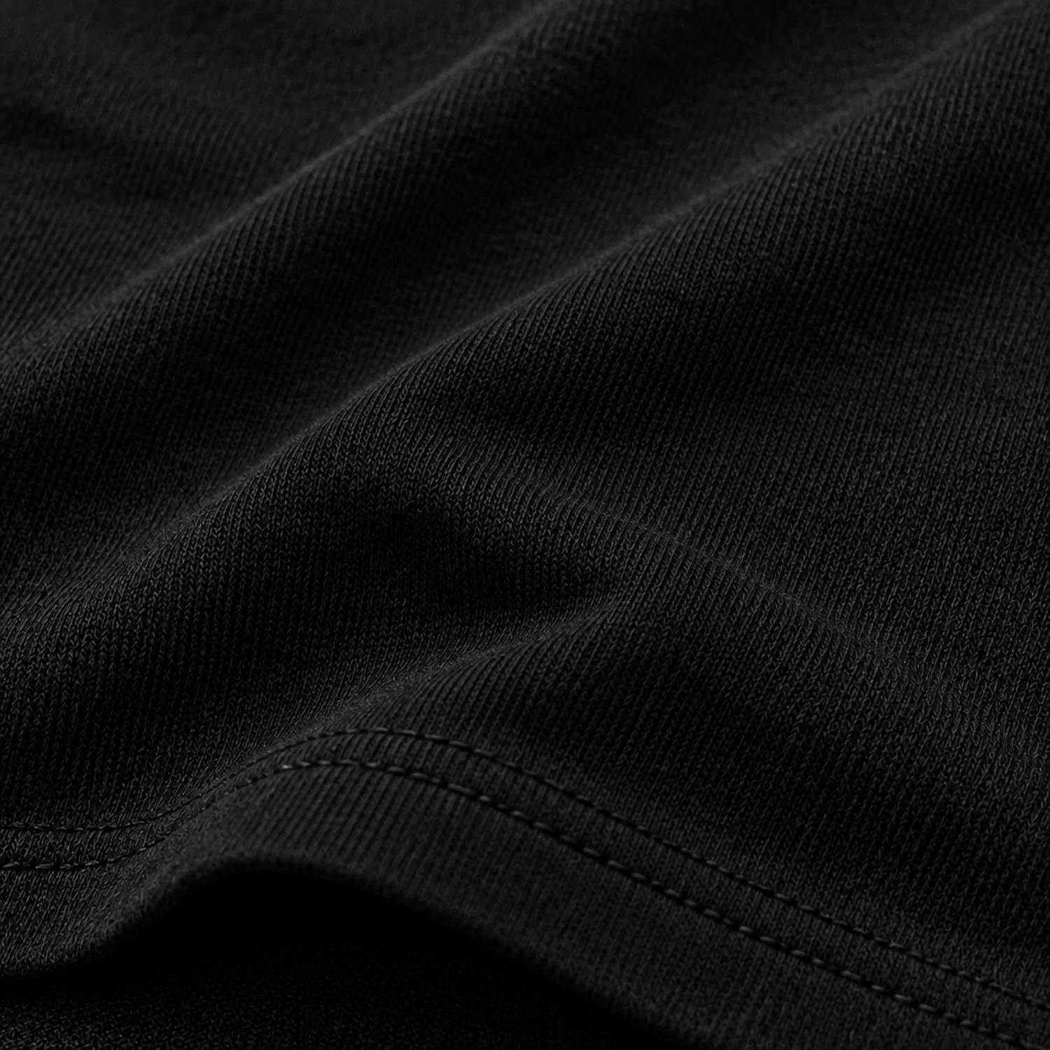 A detailed close-up shot showcasing the T-shirt fabric's texture.