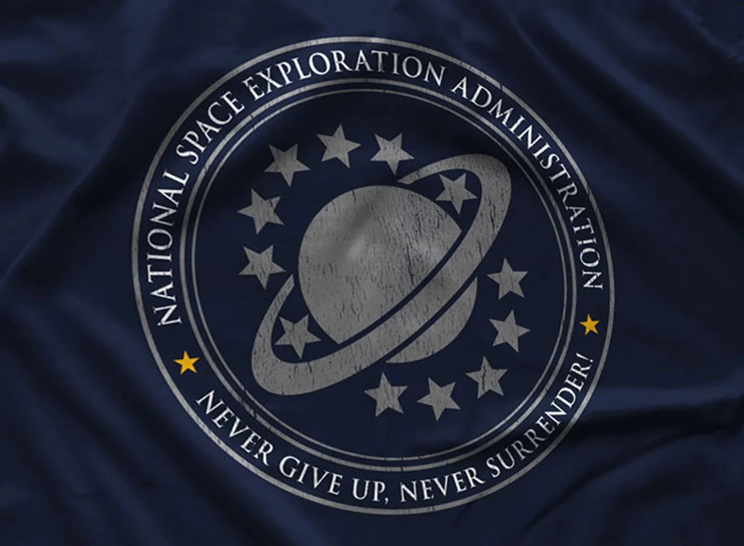 Close-up of a NSEA T-shirt in Navy Blue. Get your "Galaxy Quest"-inspired shirt in sizes S to 5XL, starting at just $21.49 with free shipping.