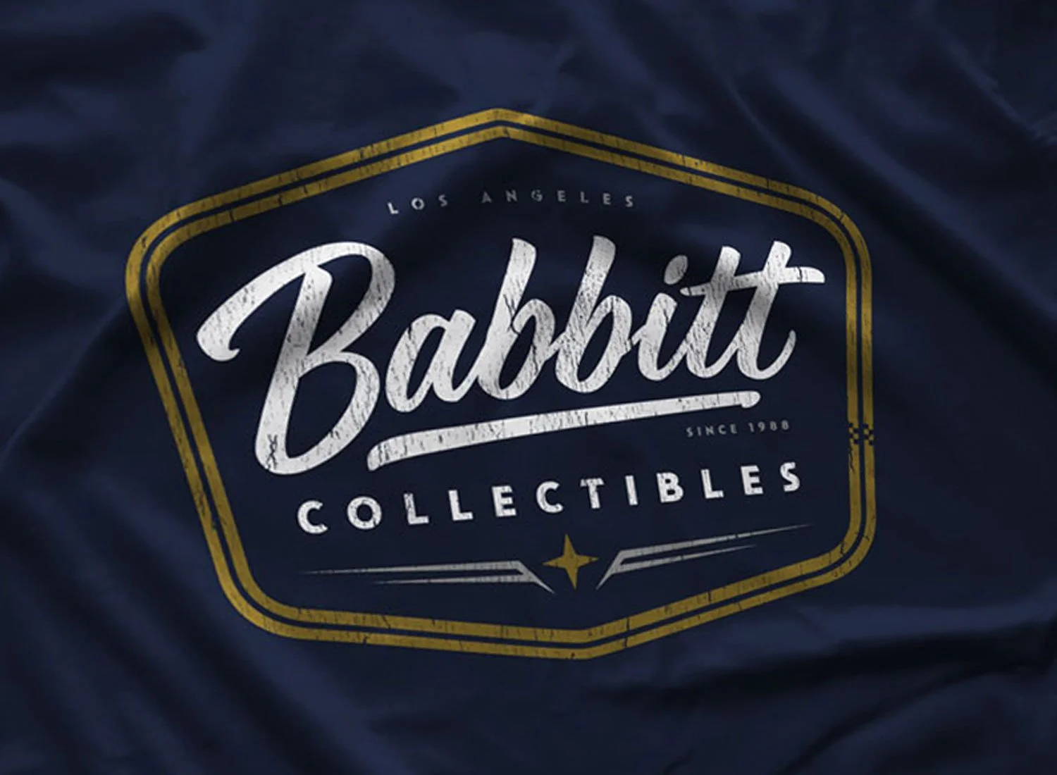 Close-up of a Babbitt Collectibles T-shirt in Navy Blue. Get your "Rain Man"-inspired shirt in sizes S to 5XL, starting at just $21.49 with free shipping.