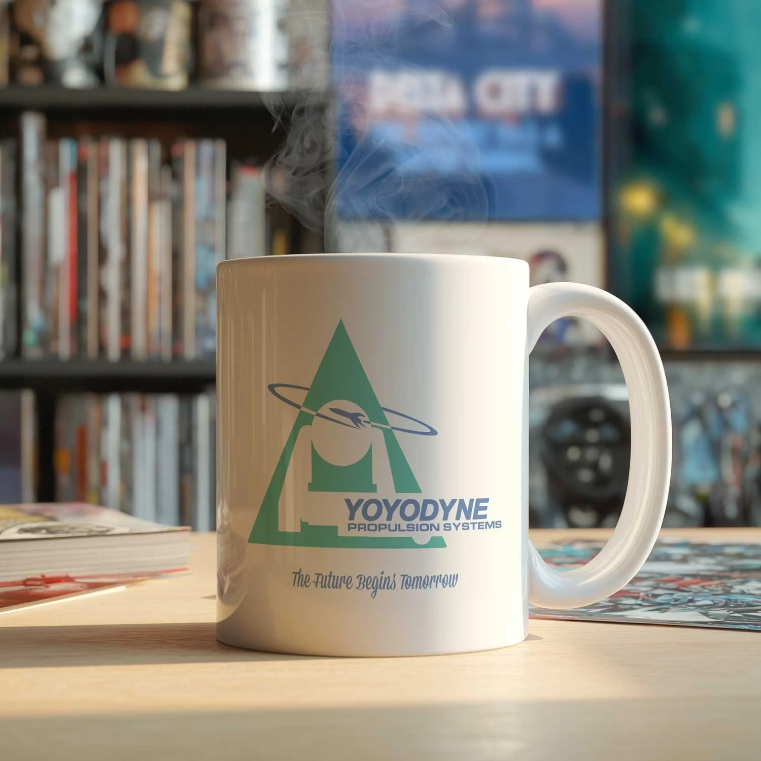 A Yoyodyne Mug with coffee is shown on a table.