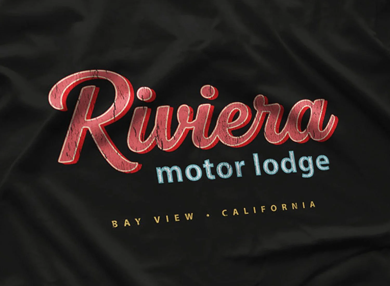 Close-up of a Riviera Motor Lodge T-Shirt in Black. Get your "Raising Cain"- inspired shirt in sizes S to 5XL, starting at just $21.49 with free shipping.