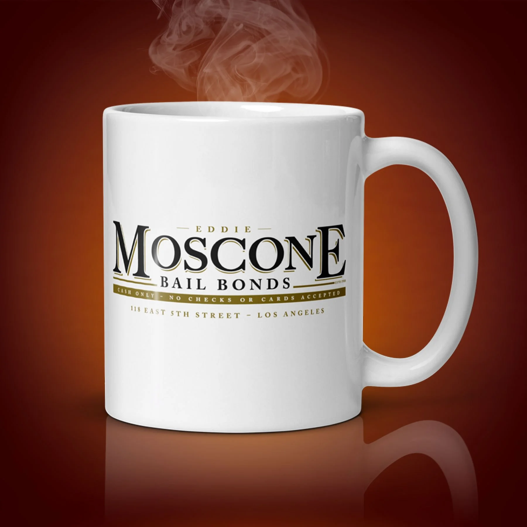 An 11-oz Moscone Bail Bonds Mug displays the left side. The artwork on our mug is inspired by the movie "Midnight Run". It is available for $21.99 with free shipping.