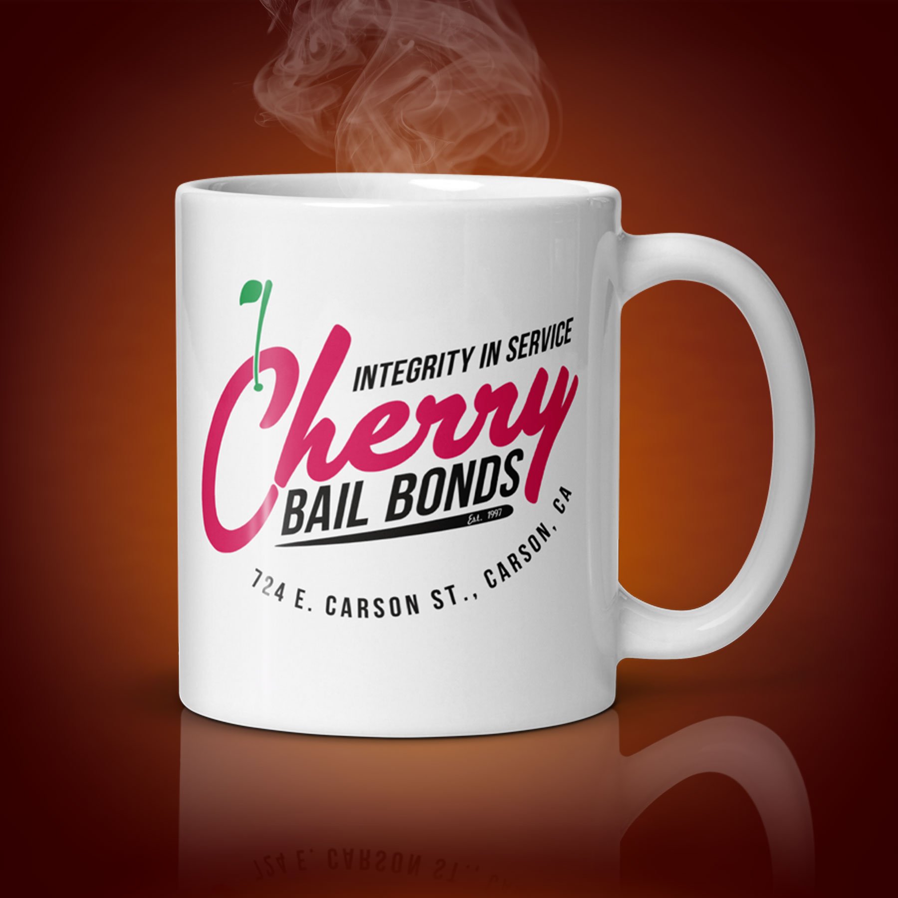 An 11-oz Cherry Bail Bonds mug displays the left side. The artwork on our mug is inspired by the movie "Jackie Brown." It is available for $21.99 with free shipping.