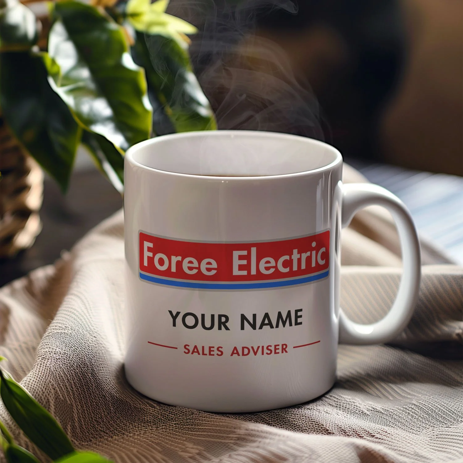 A personalized Foree Electric Mug is displayed on a table, filled with coffee.