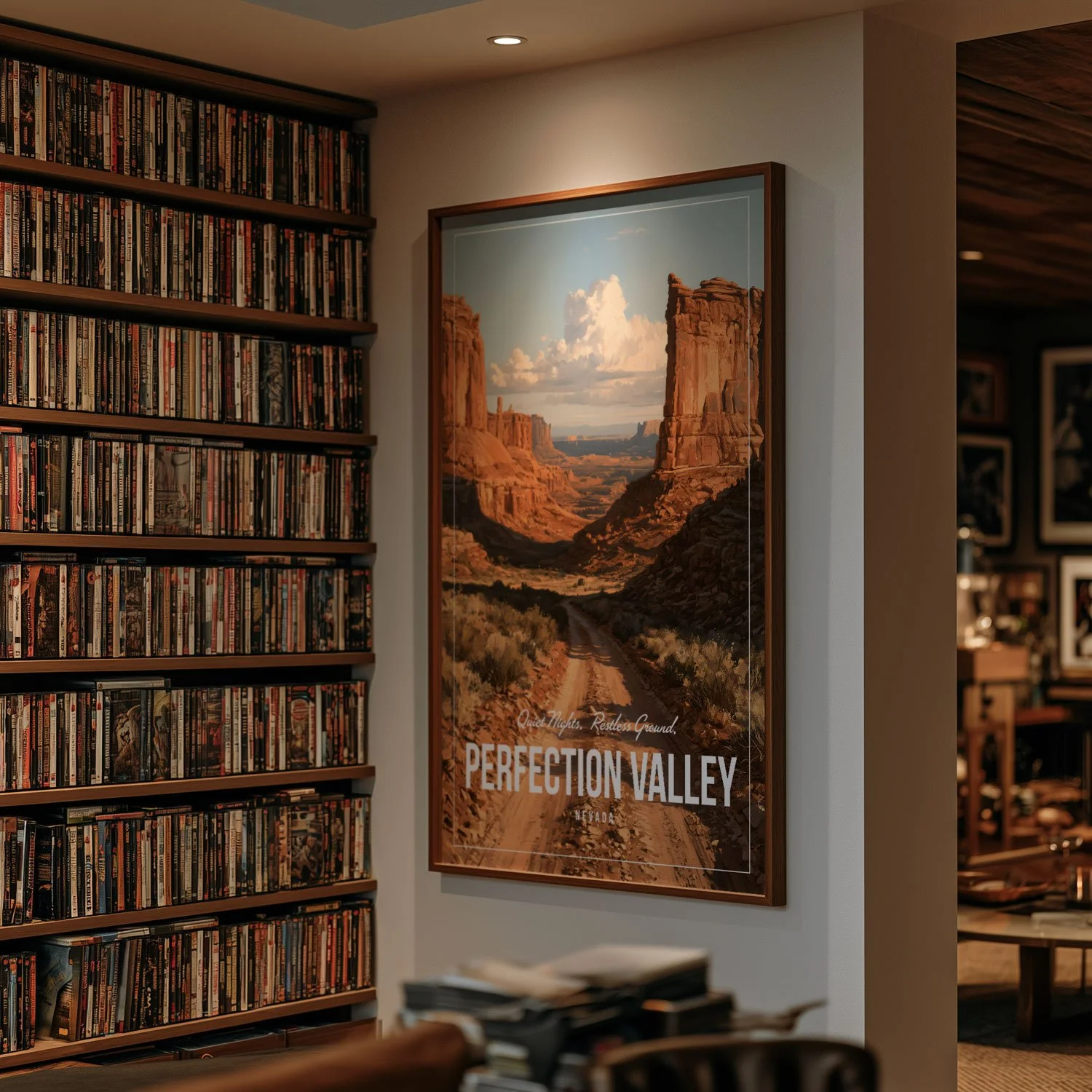 A framed 24x36-inch poster of Perfection Valley hangs on a white wall next to shelves filled with DVDs. It costs from $24.99, and shipping is included.