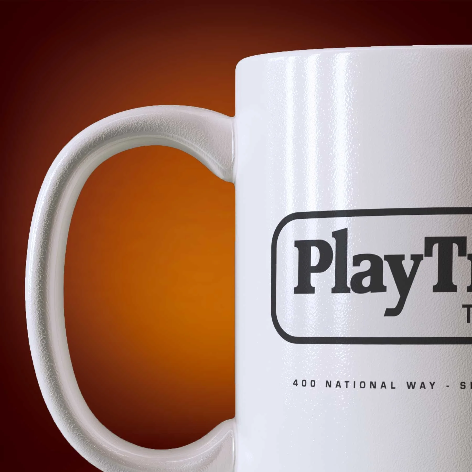 Close-up of an 11-oz PlayTronics mug.